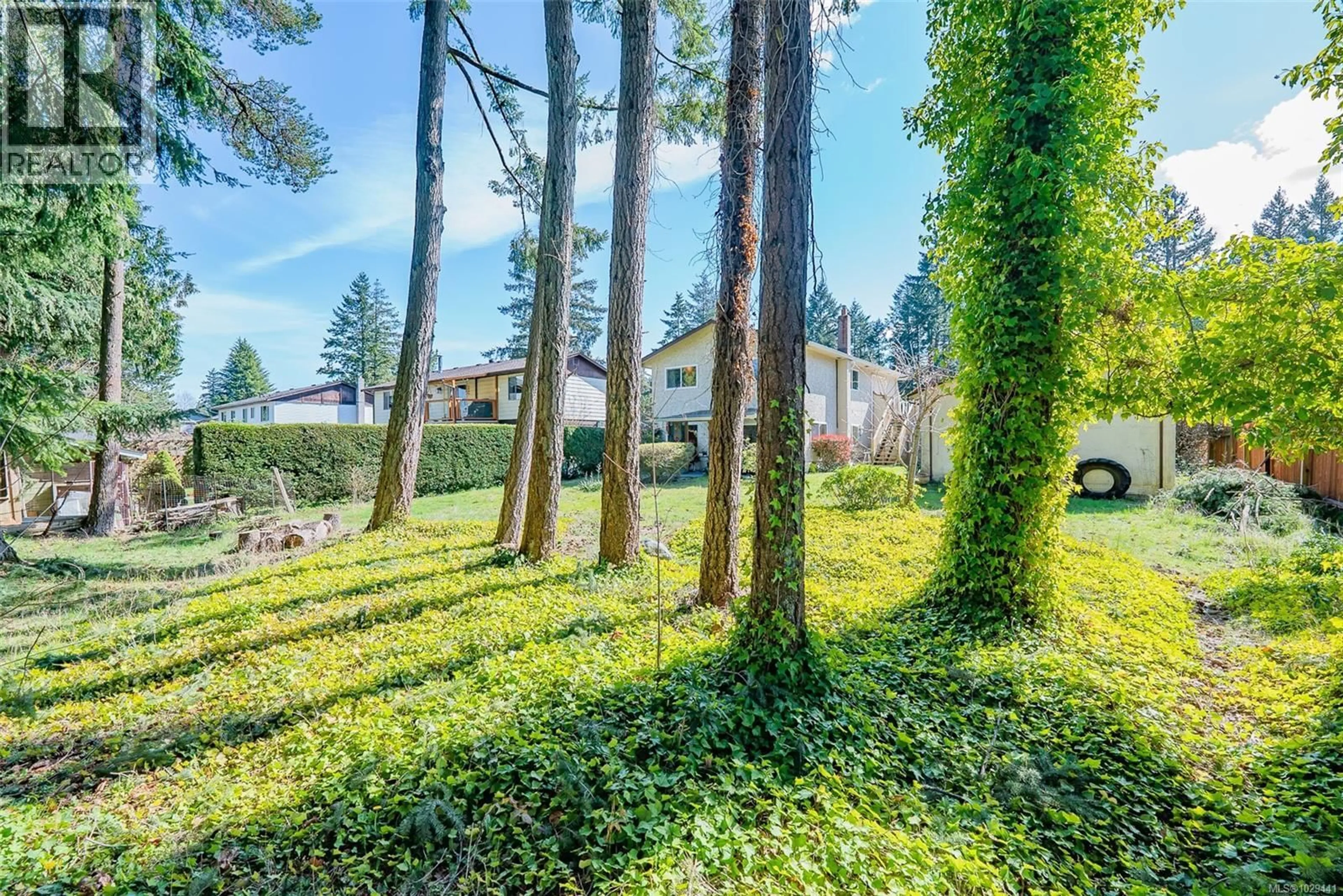 A pic from outside/outdoor area/front of a property/back of a property/a pic from drone, forest/trees view for 2654 STARLIGHT TRAIL, Nanaimo British Columbia V9T3S7