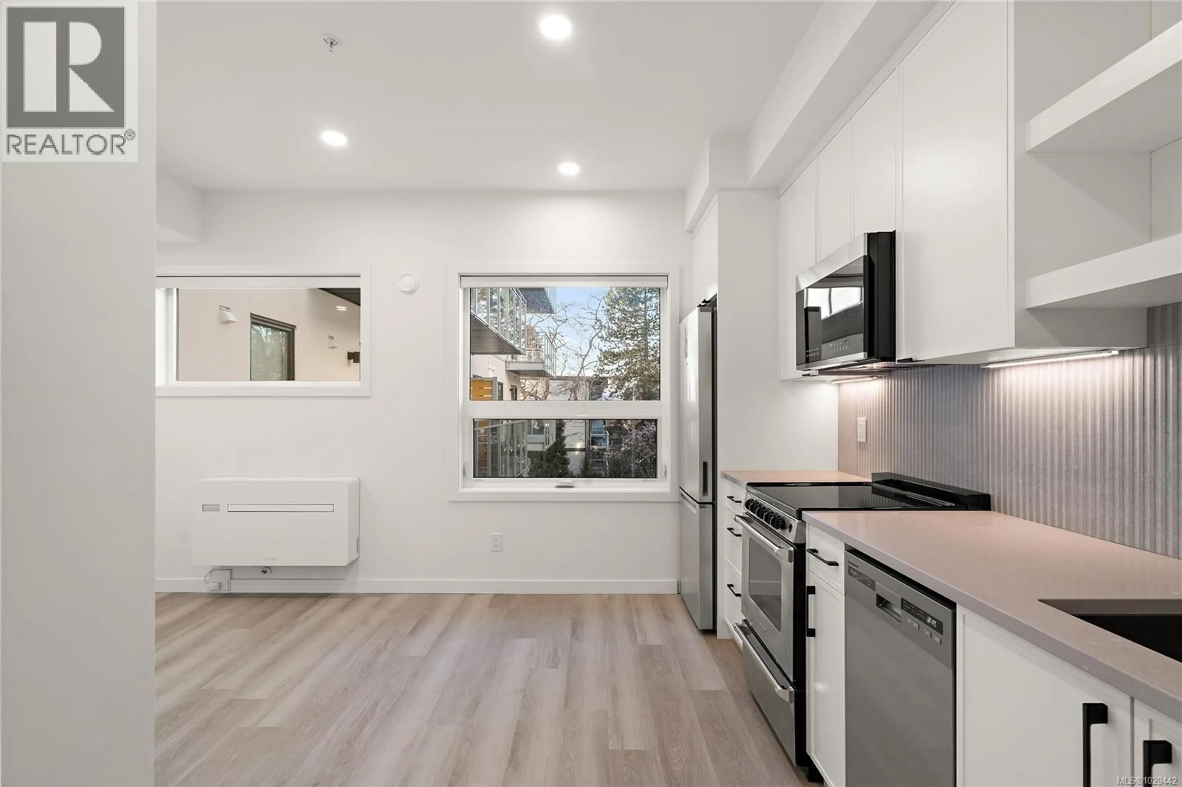 Open concept kitchen, unknown for 205 - 1102 ESQUIMALT ROAD, Esquimalt British Columbia V9A0L3