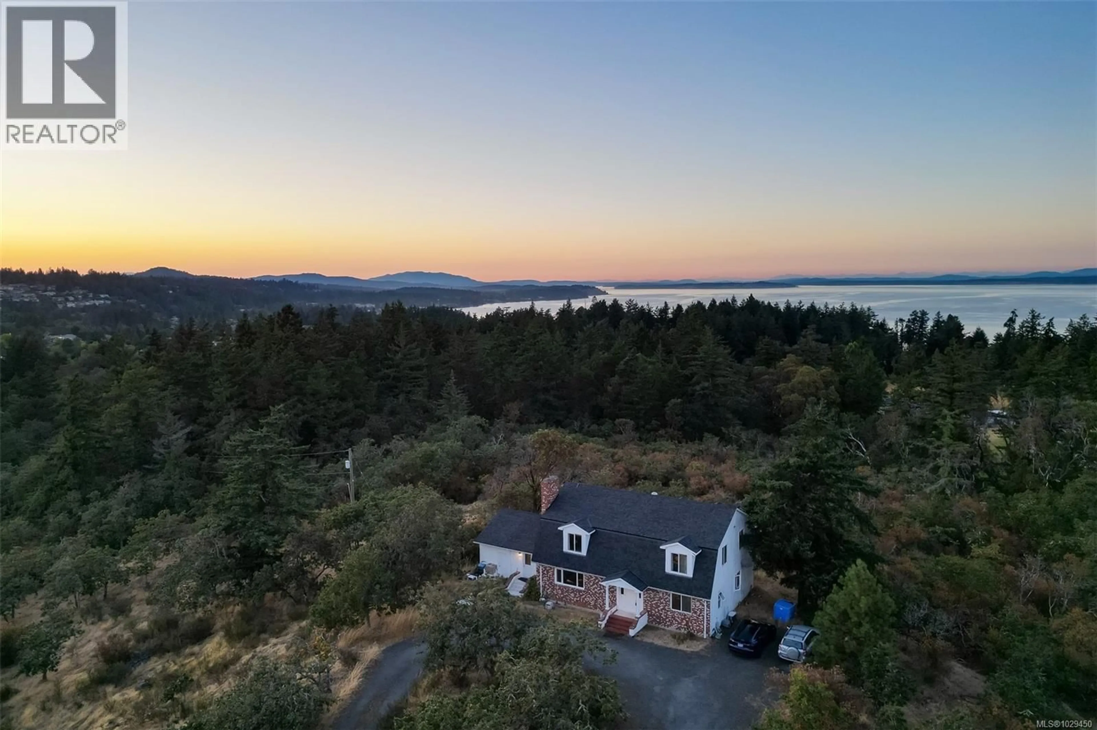A pic from outside/outdoor area/front of a property/back of a property/a pic from drone, water/lake/river/ocean view for 4589 BLENKINSOP ROAD, Saanich British Columbia V8X2C7