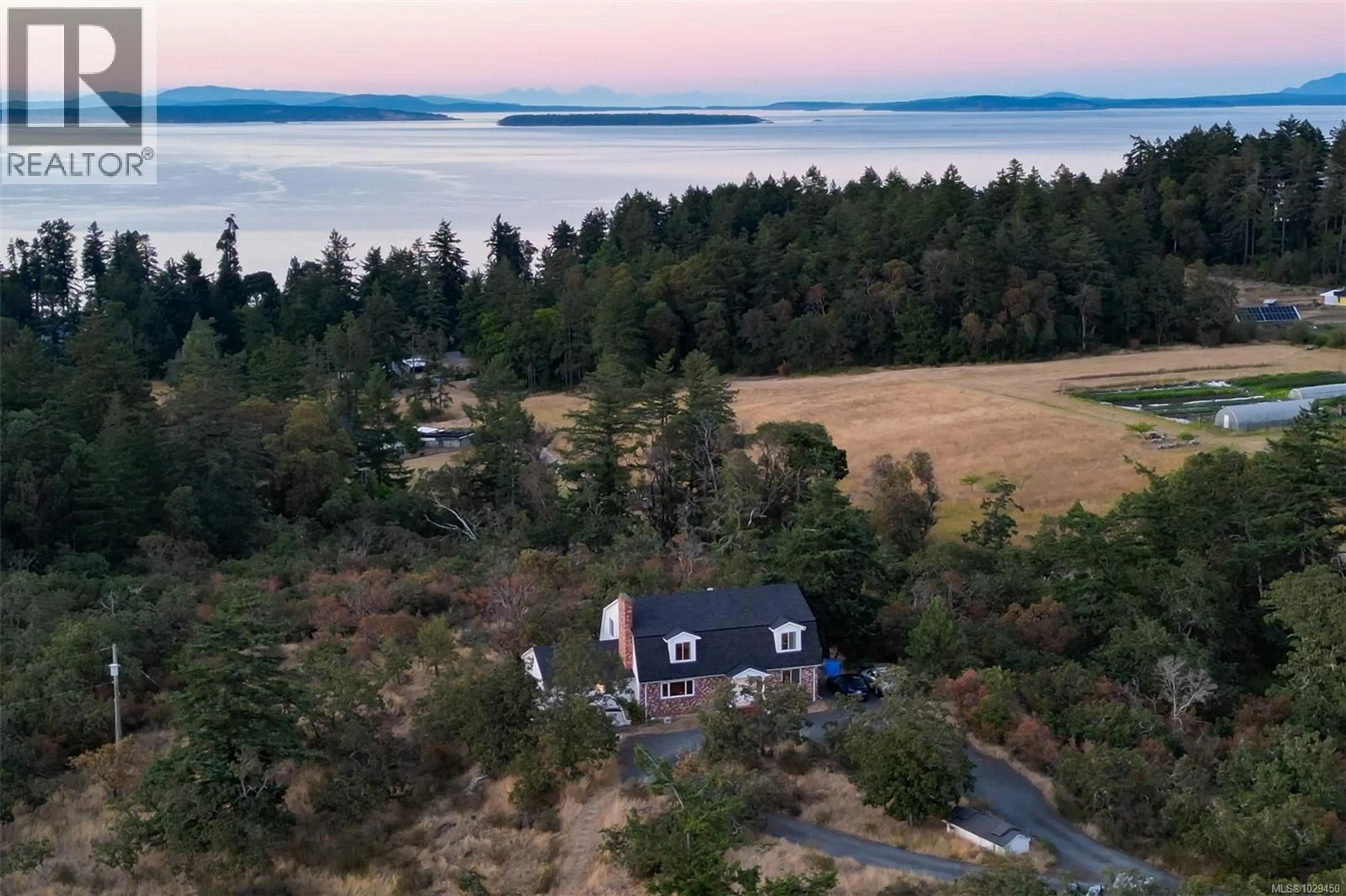 A pic from outside/outdoor area/front of a property/back of a property/a pic from drone, water/lake/river/ocean view for 4589 BLENKINSOP ROAD, Saanich British Columbia V8X2C7
