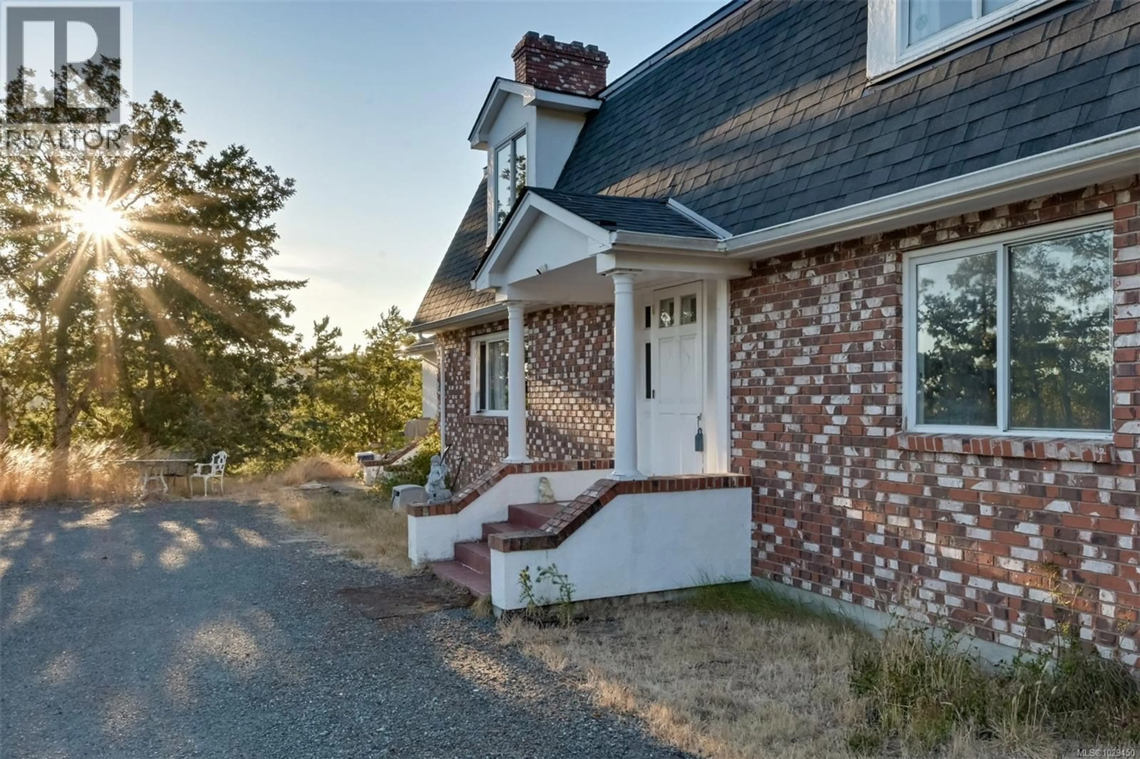 Home with brick exterior material, street for 4589 BLENKINSOP ROAD, Saanich British Columbia V8X2C7