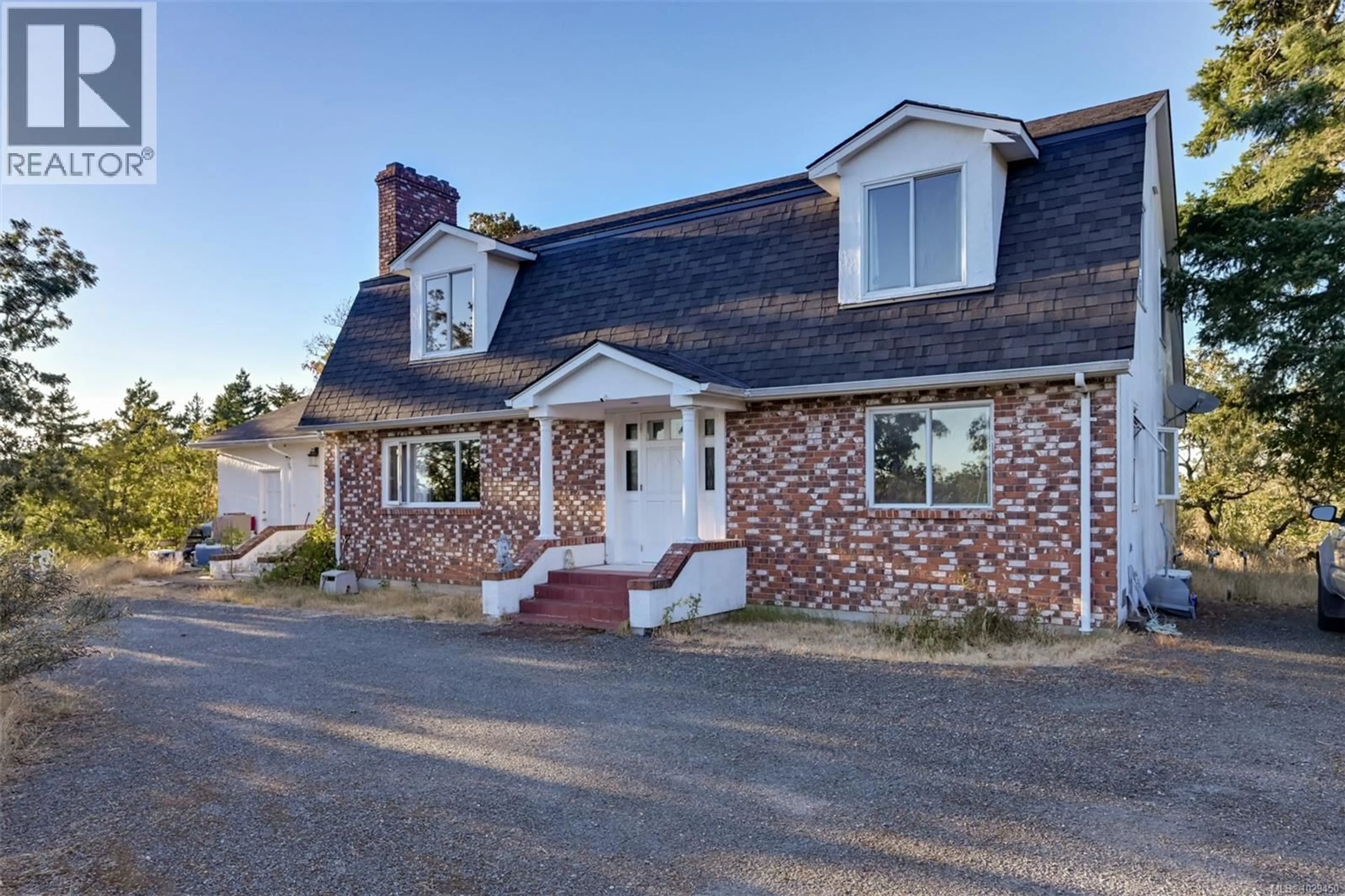 Home with brick exterior material, street for 4589 BLENKINSOP ROAD, Saanich British Columbia V8X2C7