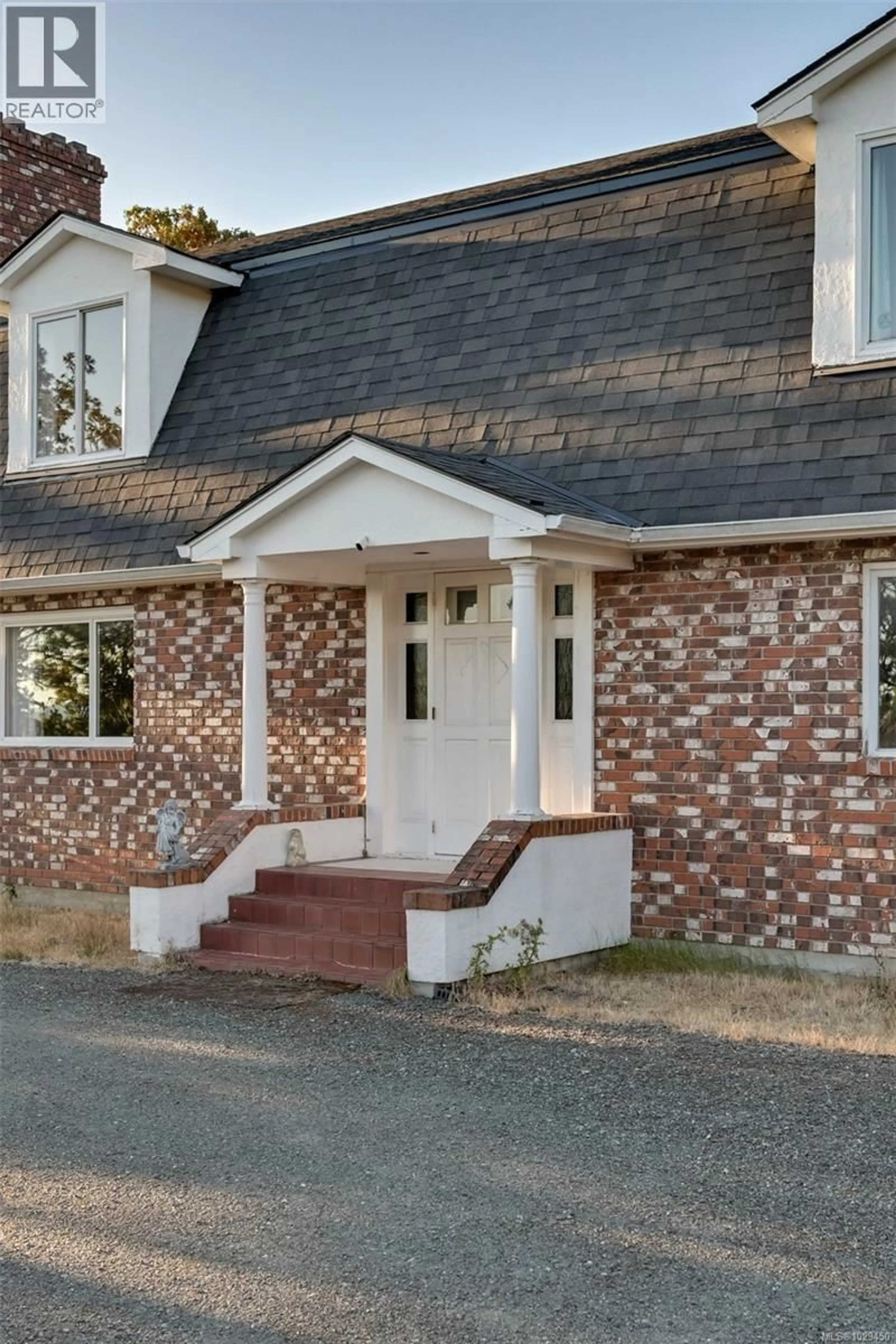 Home with brick exterior material, street for 4589 BLENKINSOP ROAD, Saanich British Columbia V8X2C7