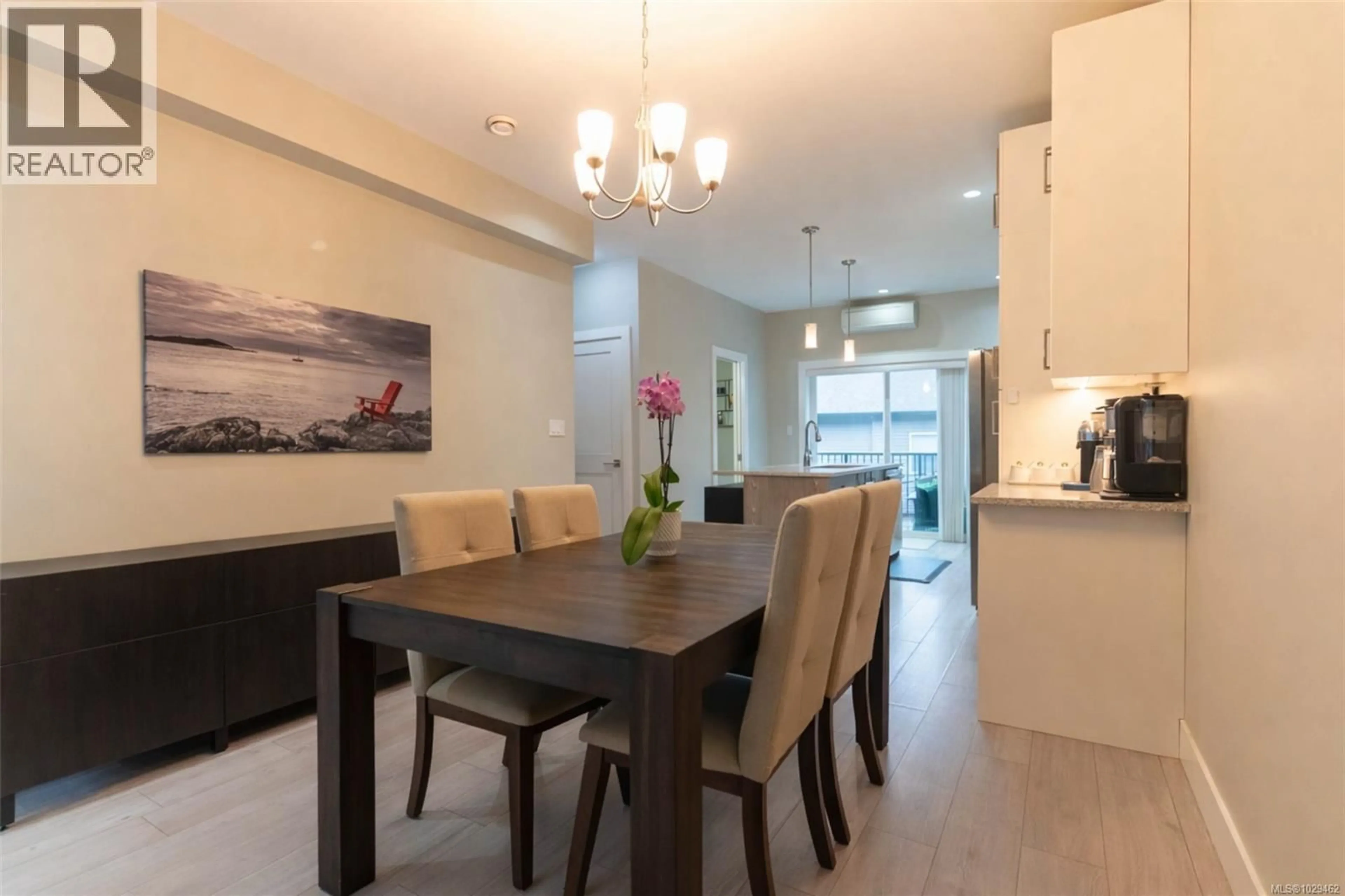 Dining room, wood/laminate floor for 107 - 933 WILD RIDGE WAY, Langford British Columbia V9C0H1