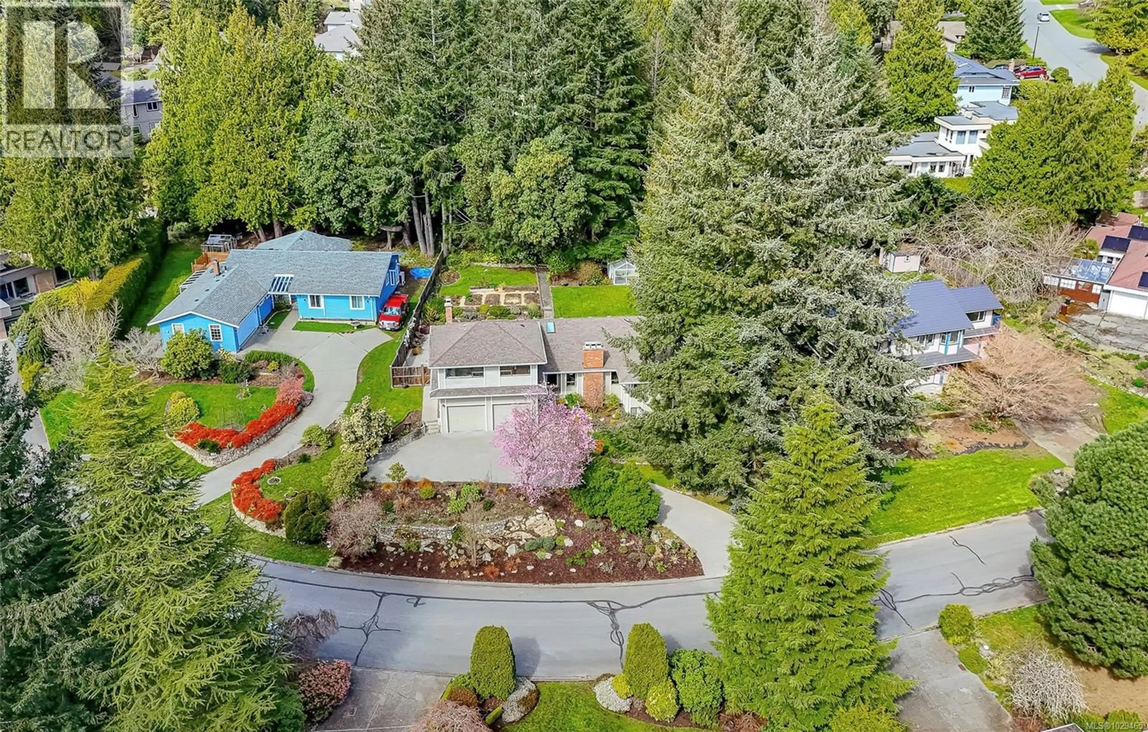 A pic from outside/outdoor area/front of a property/back of a property/a pic from drone, street for 1730 LOPEZ PLACE, North Saanich British Columbia V8L4X5