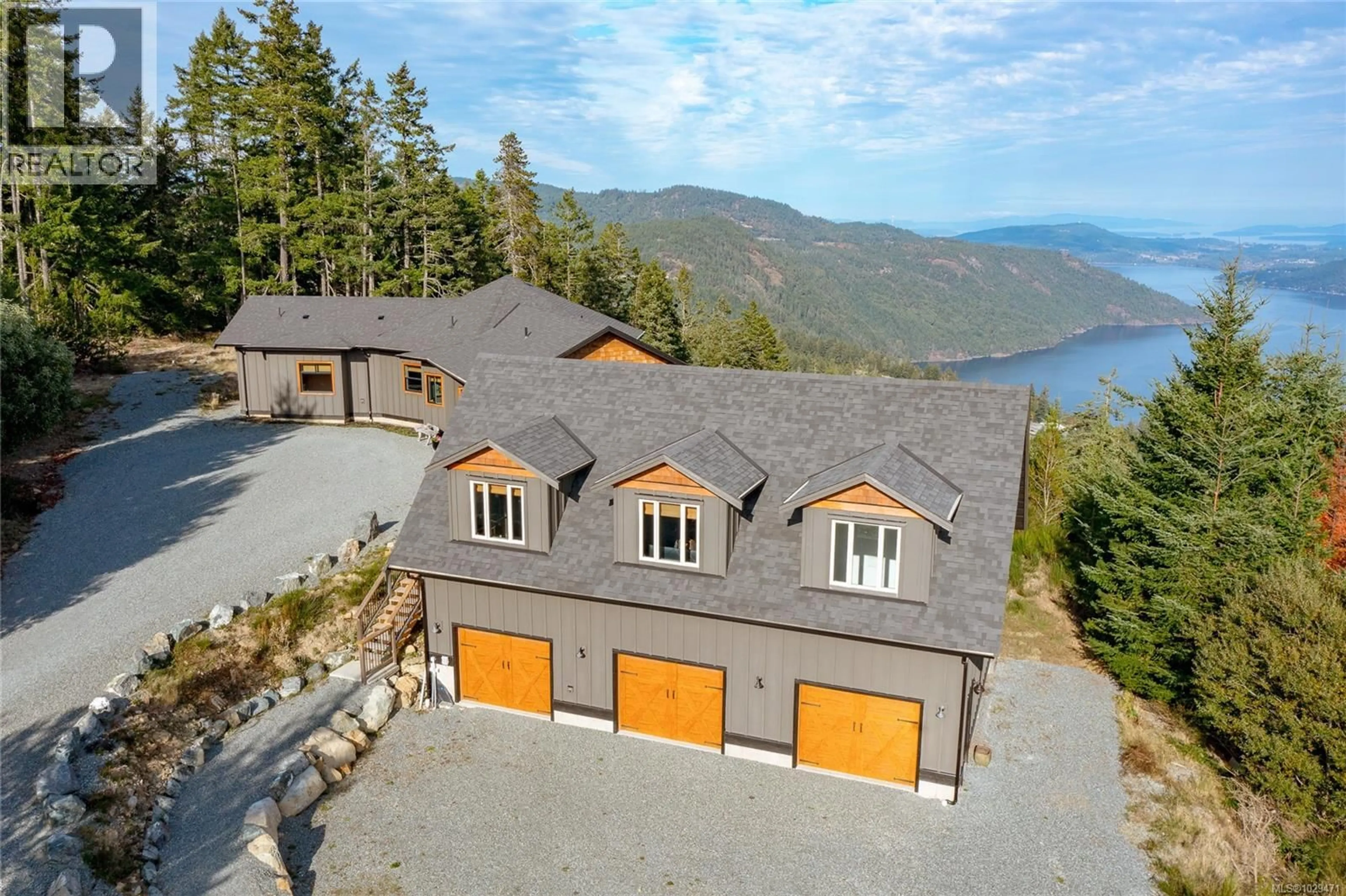A pic from outside/outdoor area/front of a property/back of a property/a pic from drone, water/lake/river/ocean view for 1490 FINLAYSON VIEW PLACE, Shawnigan Lake British Columbia V0R2W3