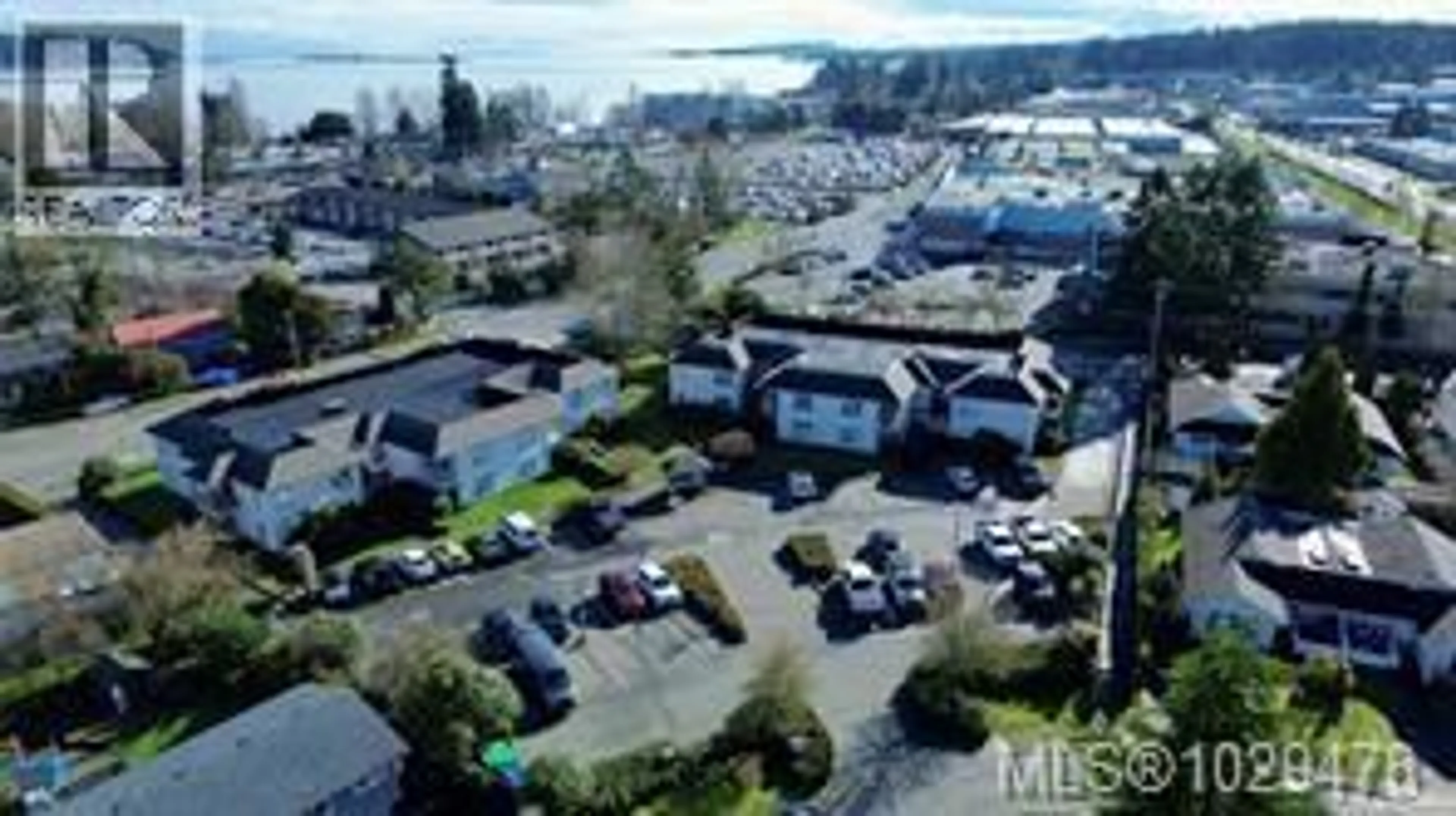 A pic from outside/outdoor area/front of a property/back of a property/a pic from drone, water/lake/river/ocean view for 202 - 2525 FITZGERALD AVENUE, Courtenay British Columbia V9N6J4