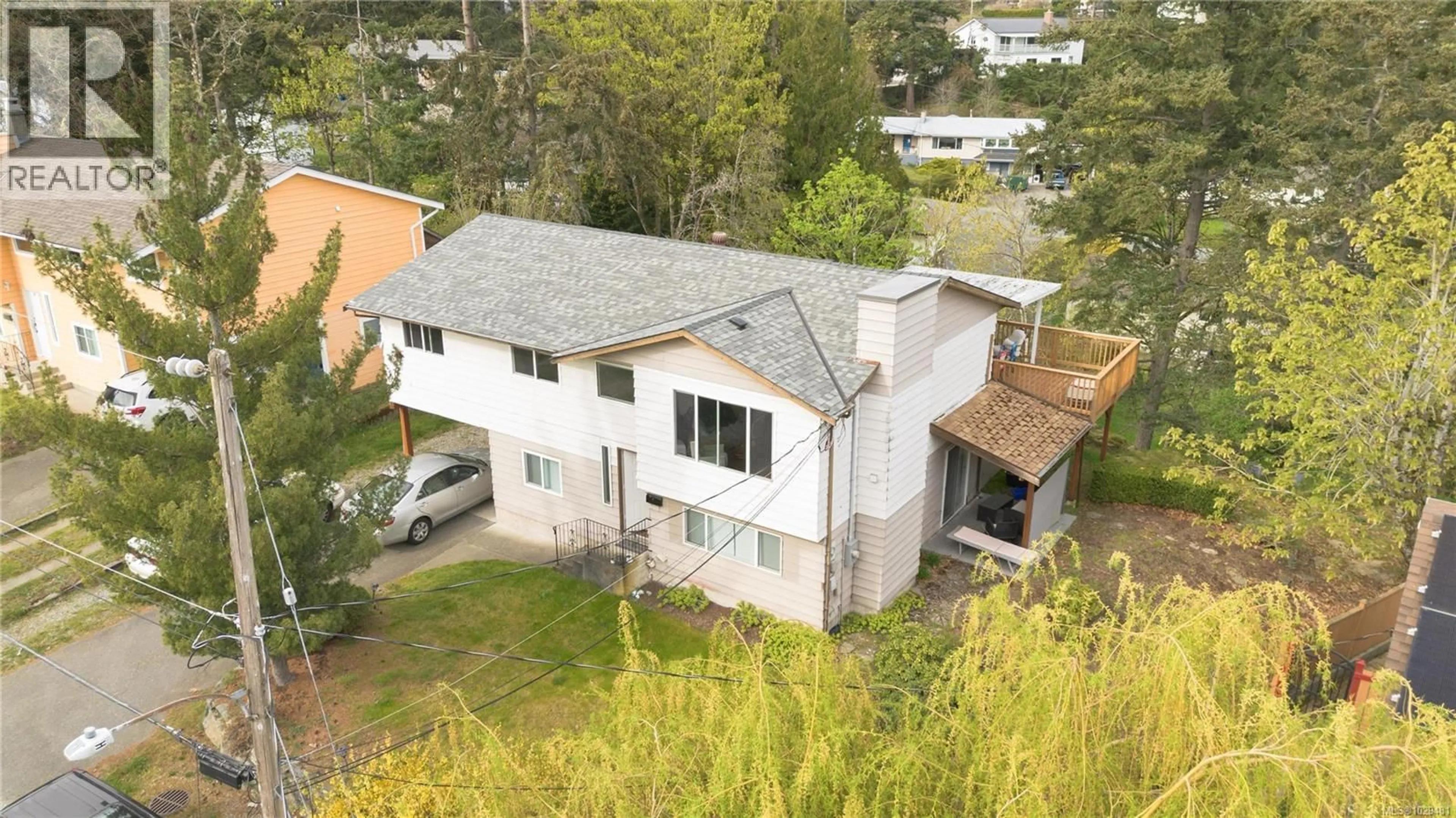 A pic from outside/outdoor area/front of a property/back of a property/a pic from drone, street for 3161 MARION WAY, Nanaimo British Columbia V9T3Z8