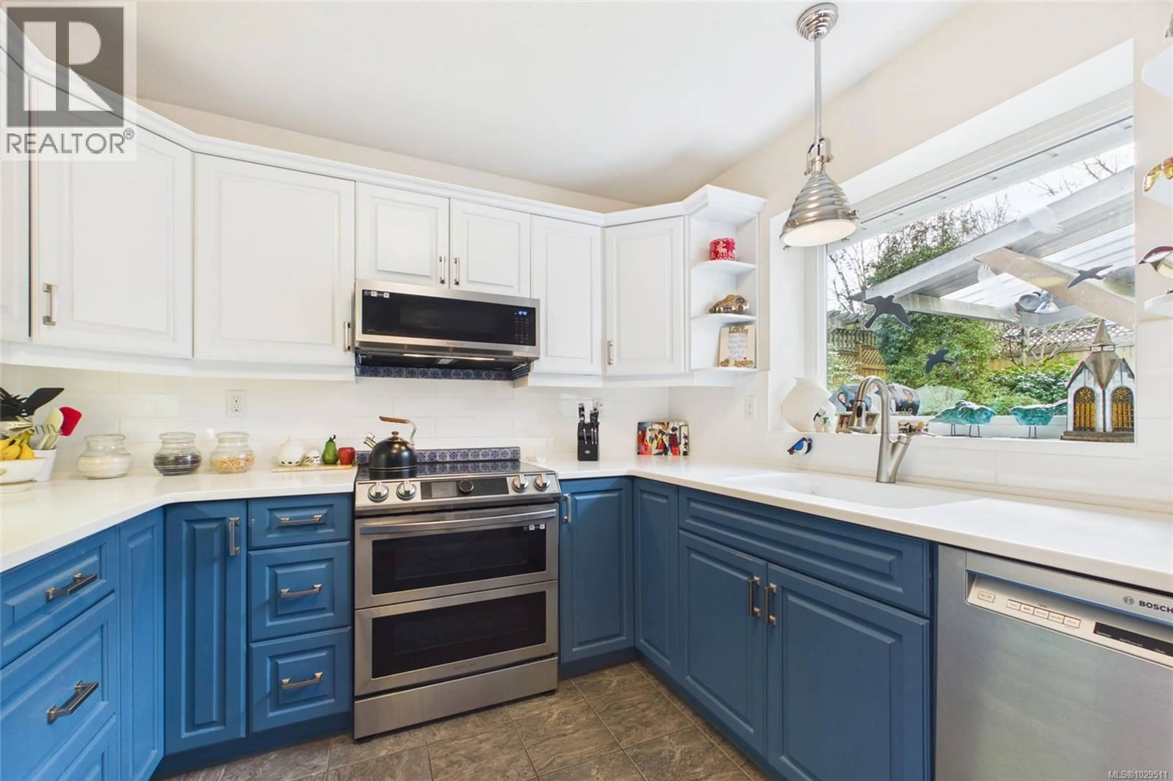 Contemporary kitchen, ceramic/tile floor for 616 TYEE CRESCENT, Qualicum Beach British Columbia V9K1B1