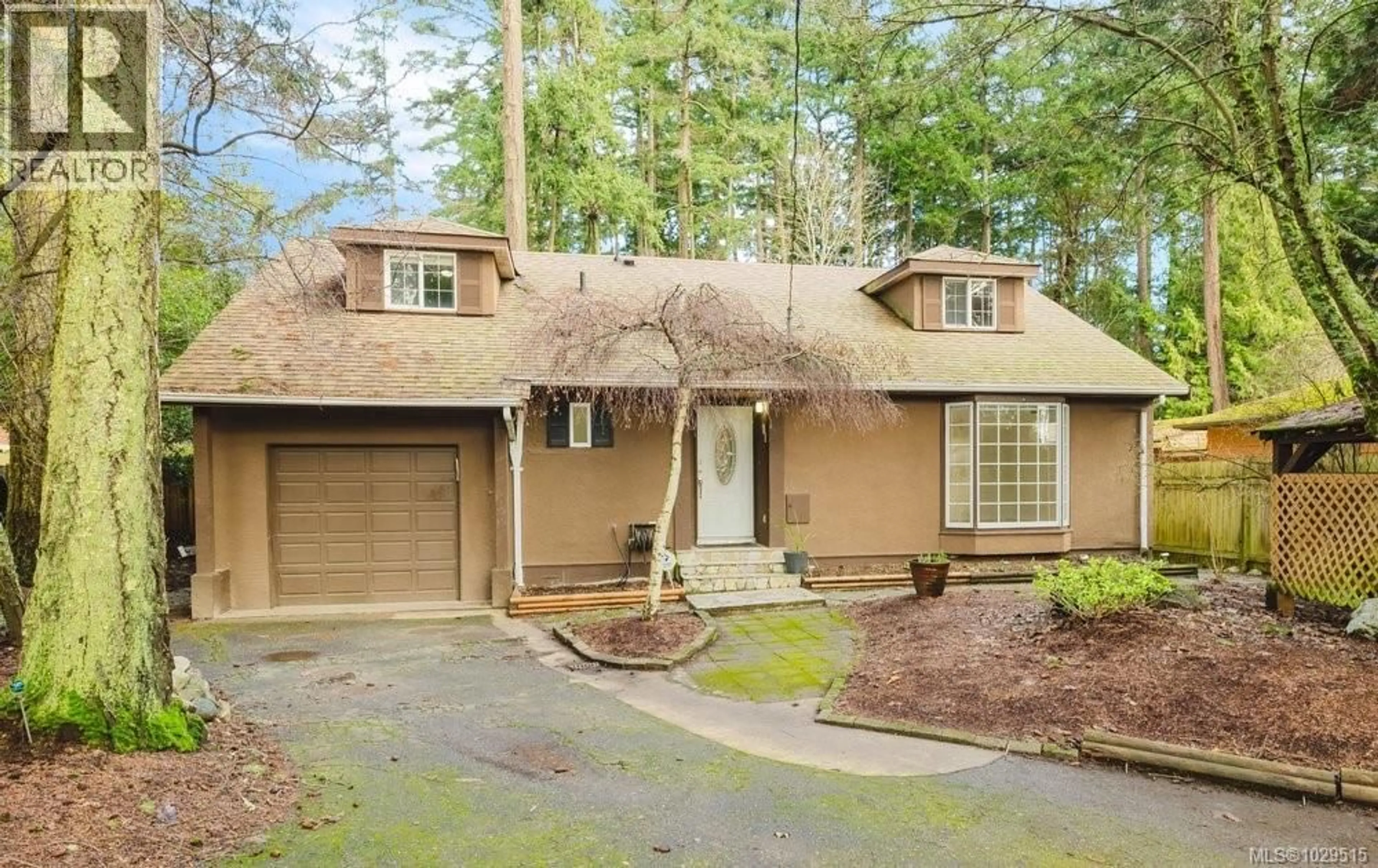 Home with vinyl exterior material, street for 4815 CORDOVA BAY ROAD, Saanich British Columbia V8Y2J8