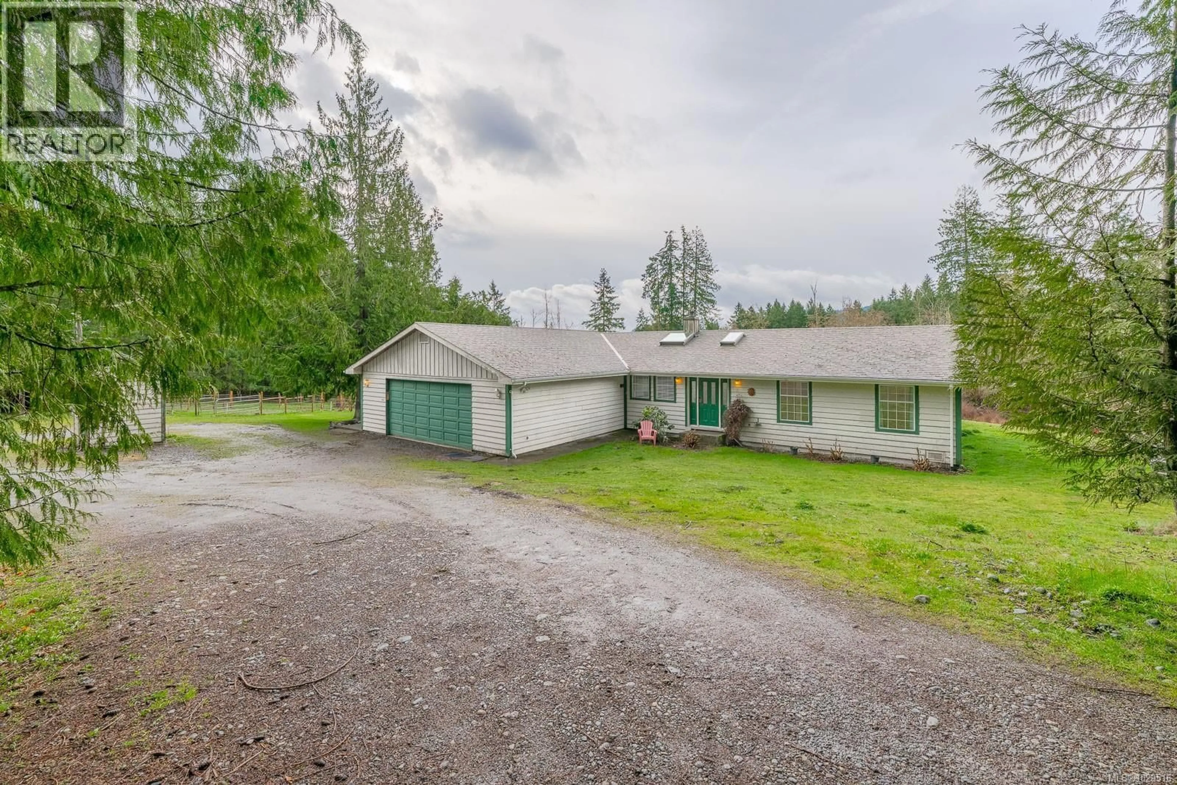 A pic from outside/outdoor area/front of a property/back of a property/a pic from drone, street for 4935 LANGTRY ROAD, Duncan British Columbia V9L2X1