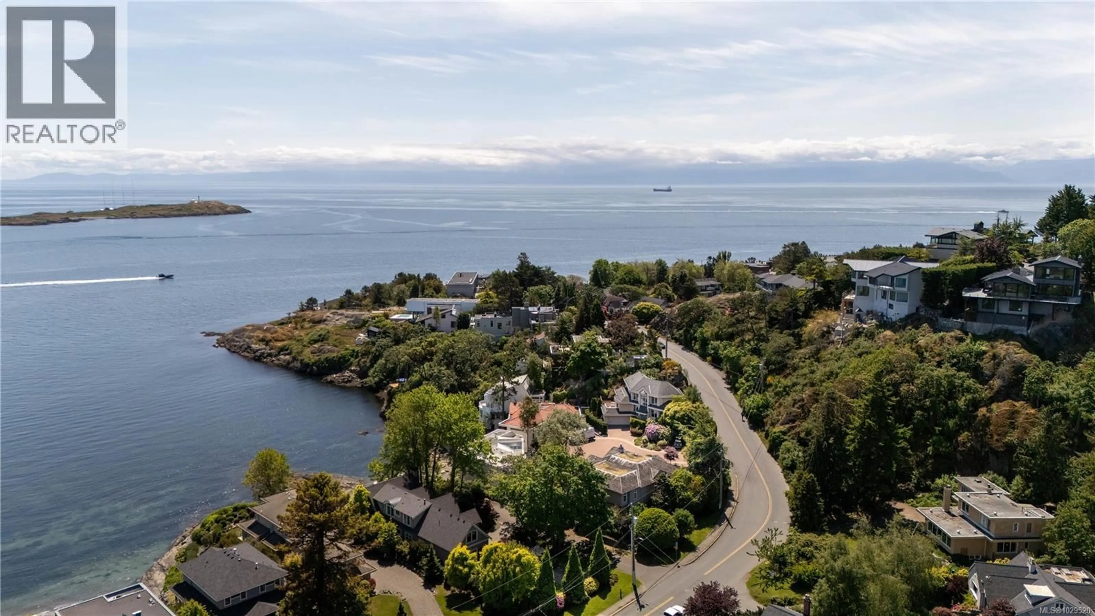 A pic from outside/outdoor area/front of a property/back of a property/a pic from drone, water/lake/river/ocean view for 335 KING GEORGE TERRACE, Oak Bay British Columbia V8S2J8