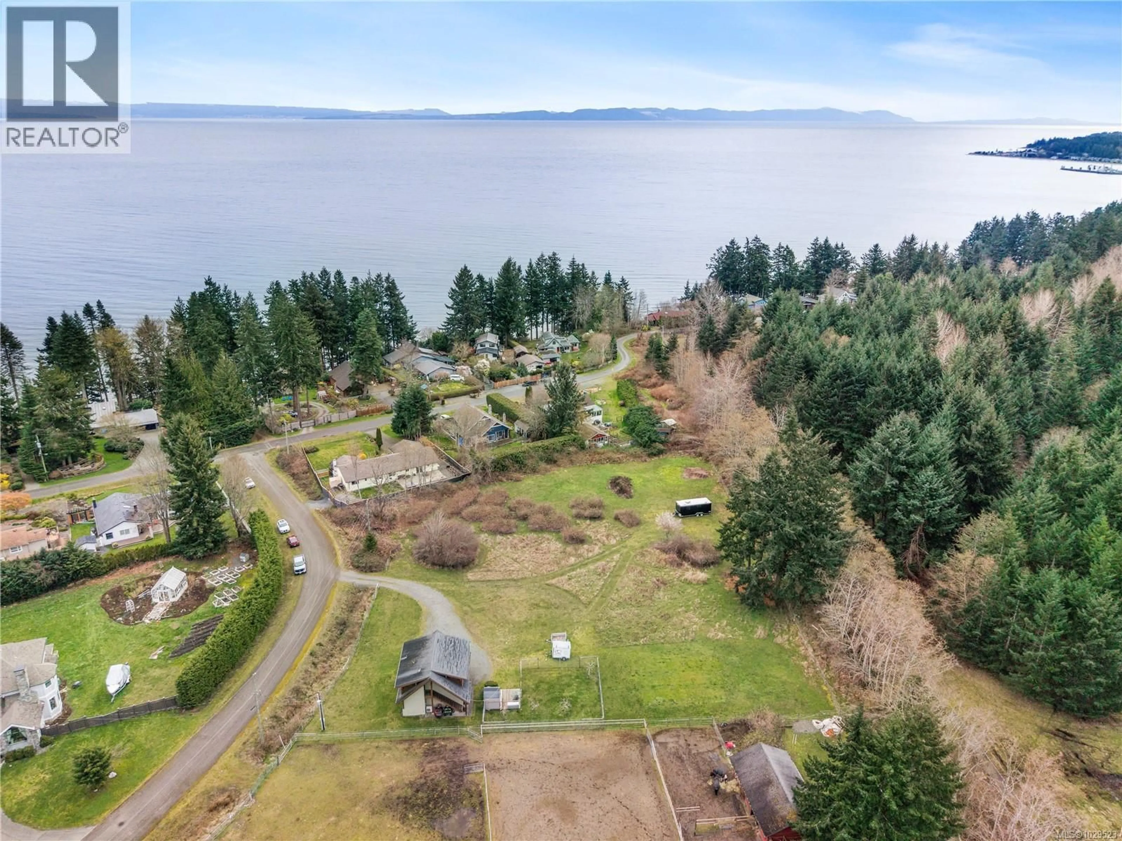 A pic from outside/outdoor area/front of a property/back of a property/a pic from drone, water/lake/river/ocean view for 1705 TAMES ROAD, Courtenay British Columbia V9J1X9
