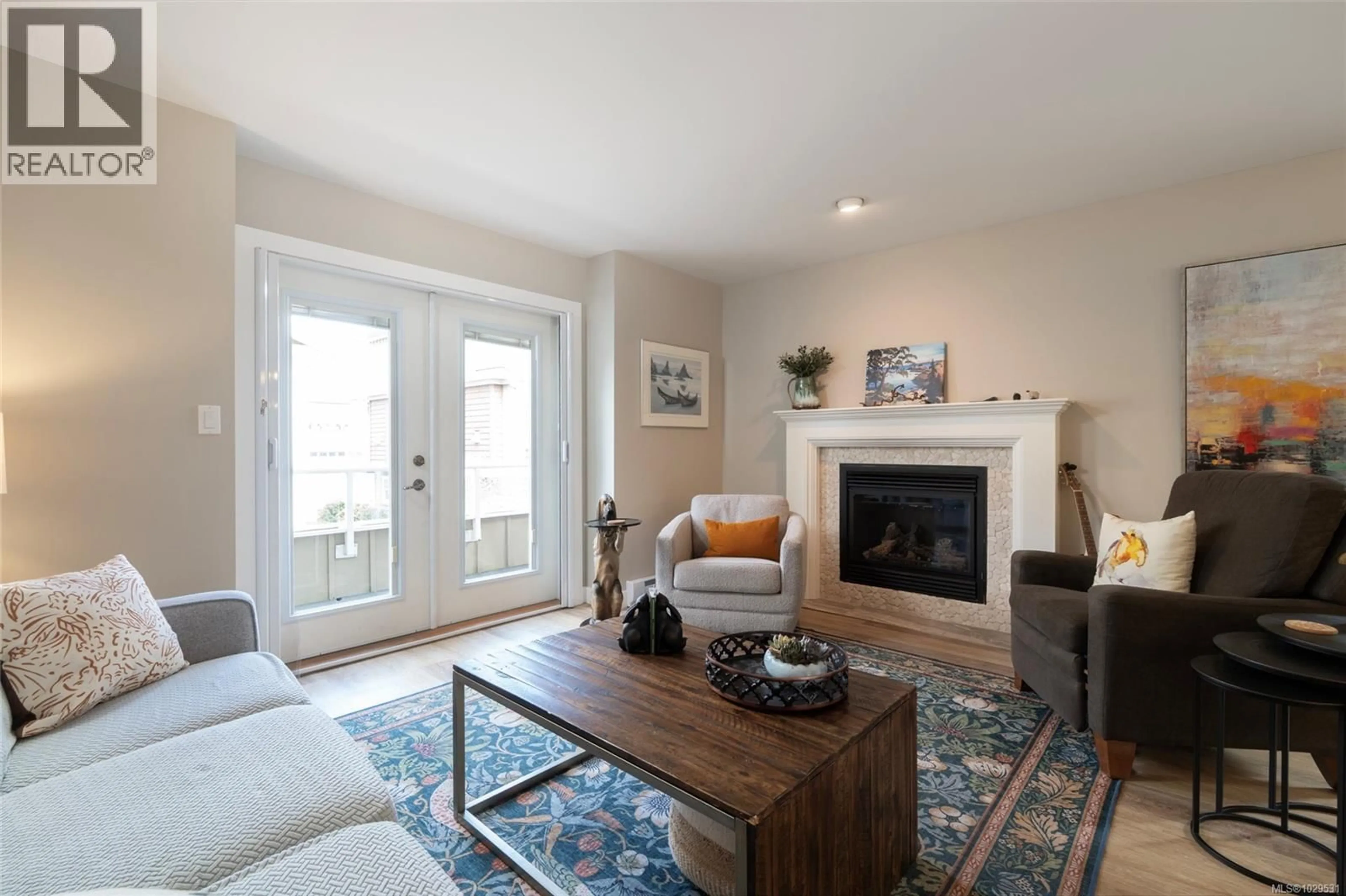 Living room with furniture, unknown for 560 HEATHERDALE LANE, Saanich British Columbia V8Z0A4