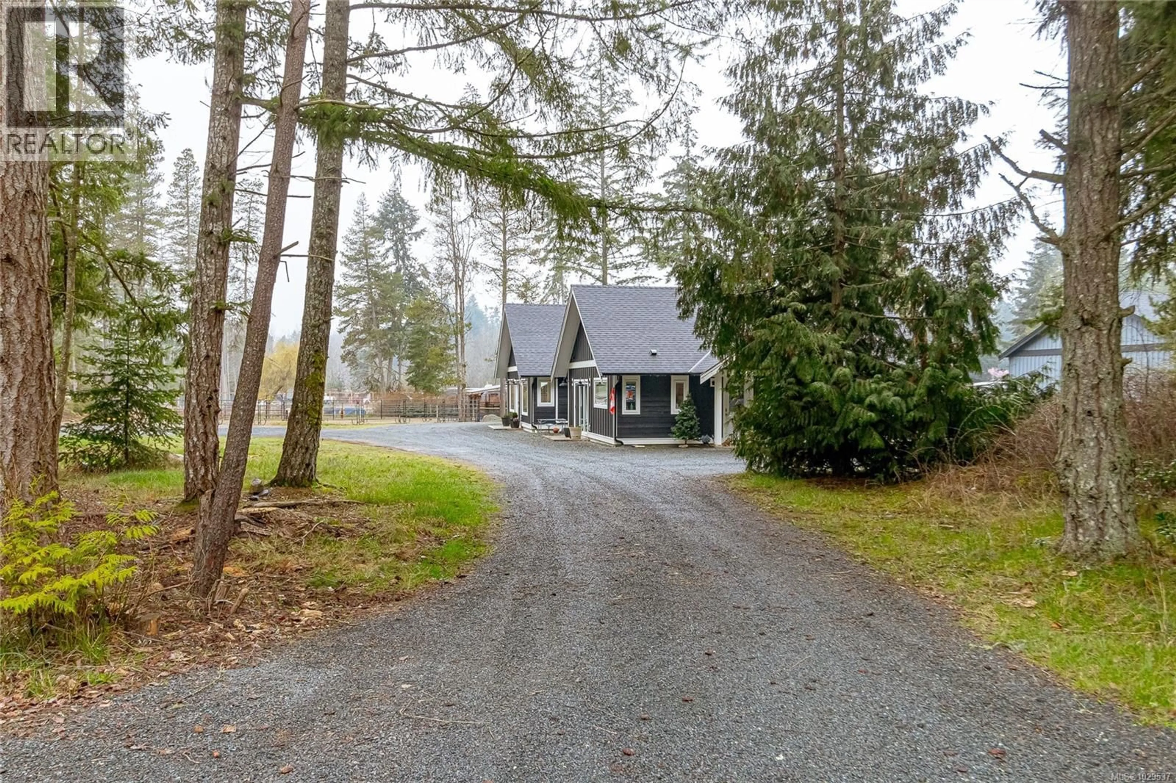 A pic from outside/outdoor area/front of a property/back of a property/a pic from drone, street for 1119 BELLEVUE ROAD, Parksville British Columbia V9P2C1
