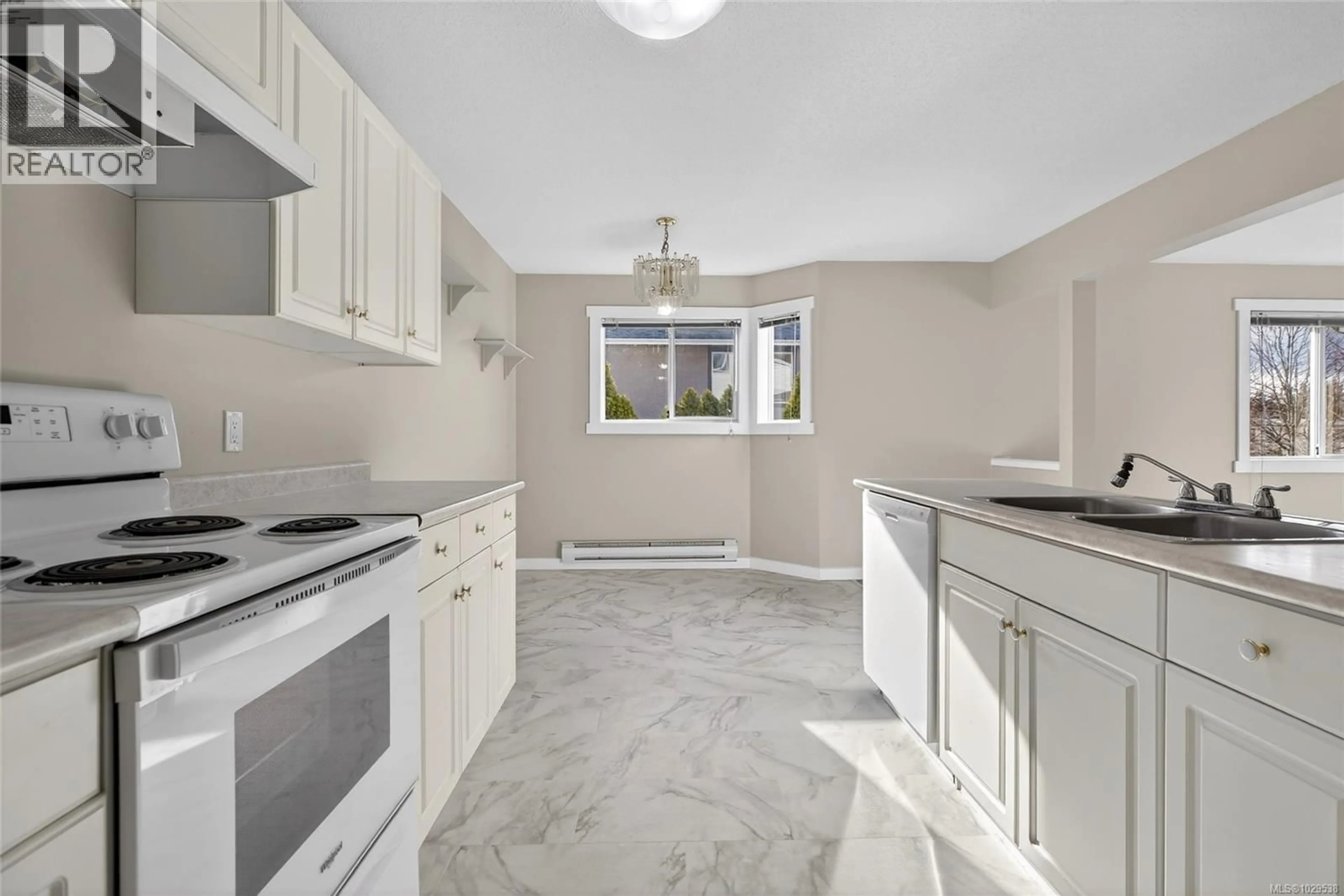 Standard kitchen, ceramic/tile floor for 202 - 2647 MUIR ROAD, Courtenay British Columbia V9N8Z4