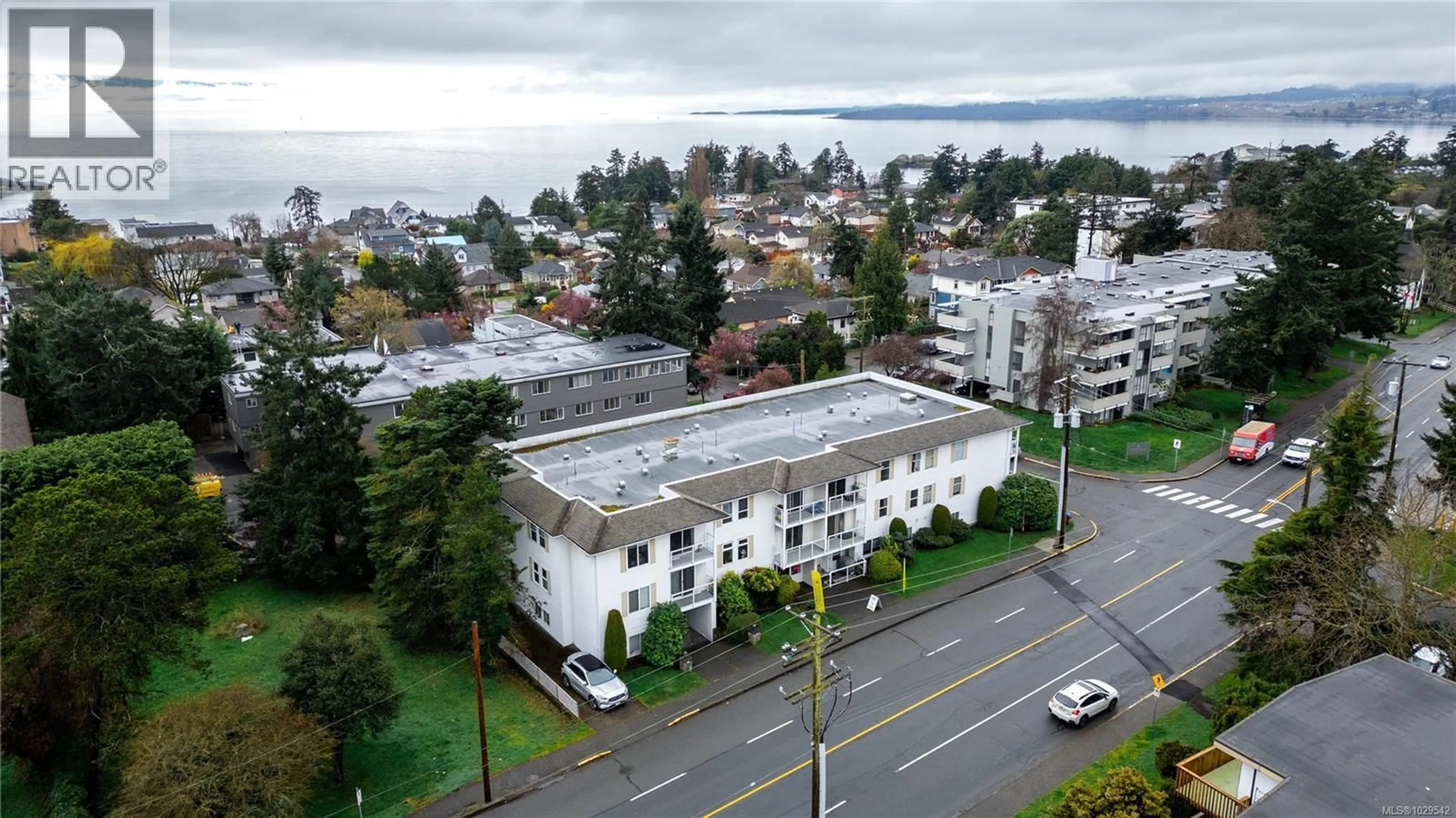 A pic from outside/outdoor area/front of a property/back of a property/a pic from drone, unknown for 308 - 1351 ESQUIMALT ROAD, Esquimalt British Columbia V9A3R1