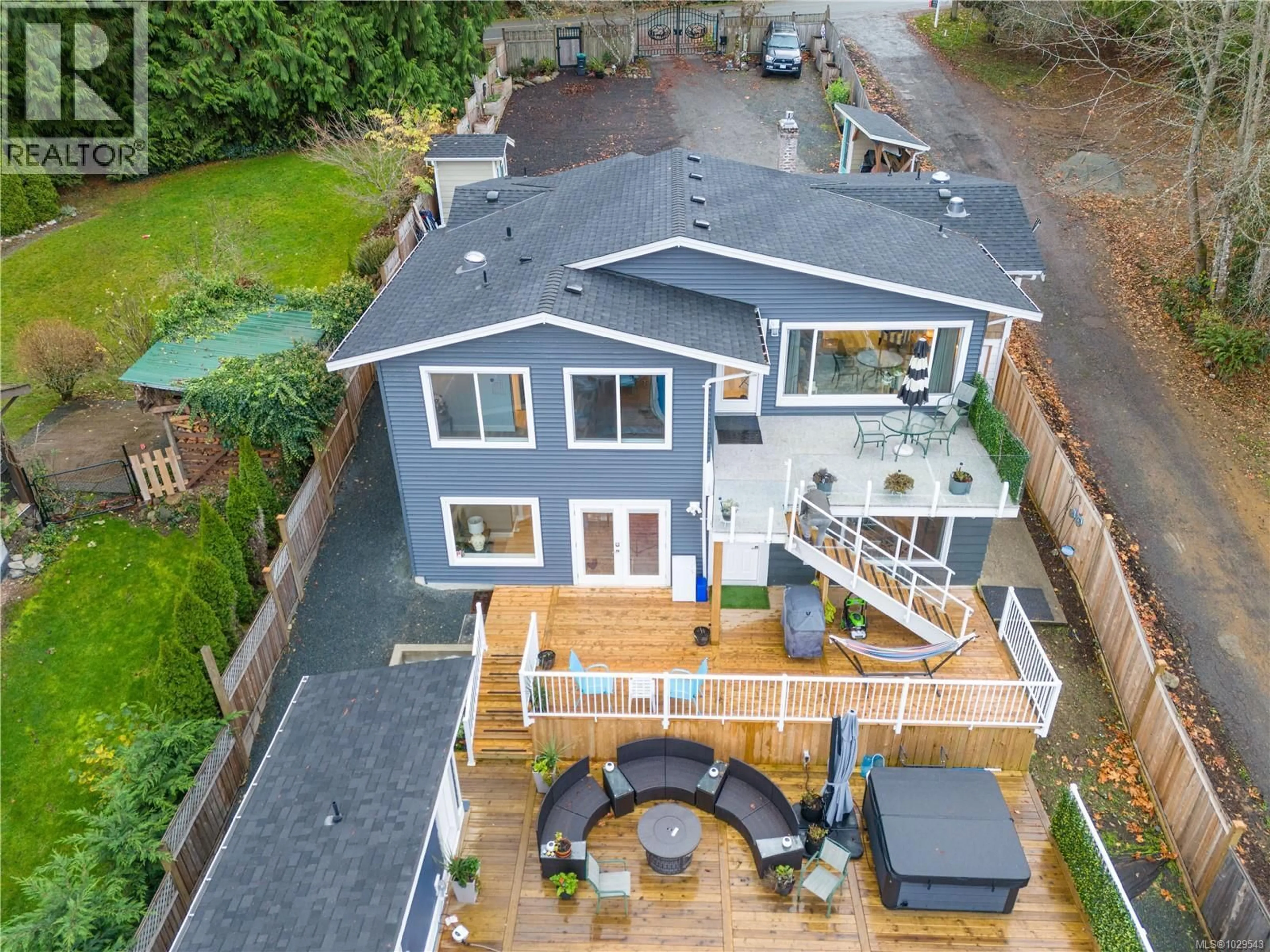 A pic from outside/outdoor area/front of a property/back of a property/a pic from drone, street for 7896 LANTZVILLE ROAD, Lantzville British Columbia V0R2H0