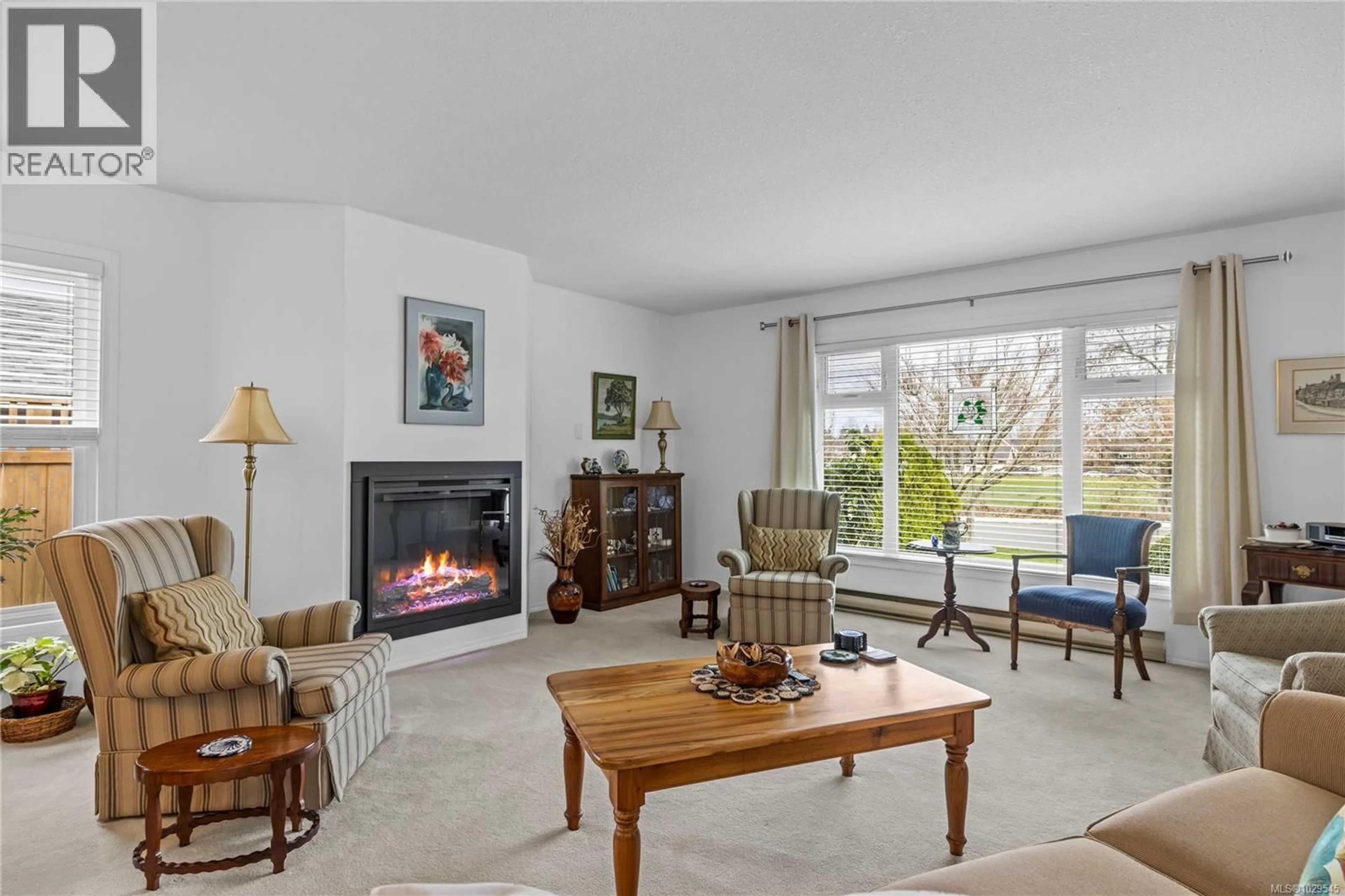 Living room with furniture, unknown for 789 PRIMROSE STREET, Qualicum Beach British Columbia V9K1S1