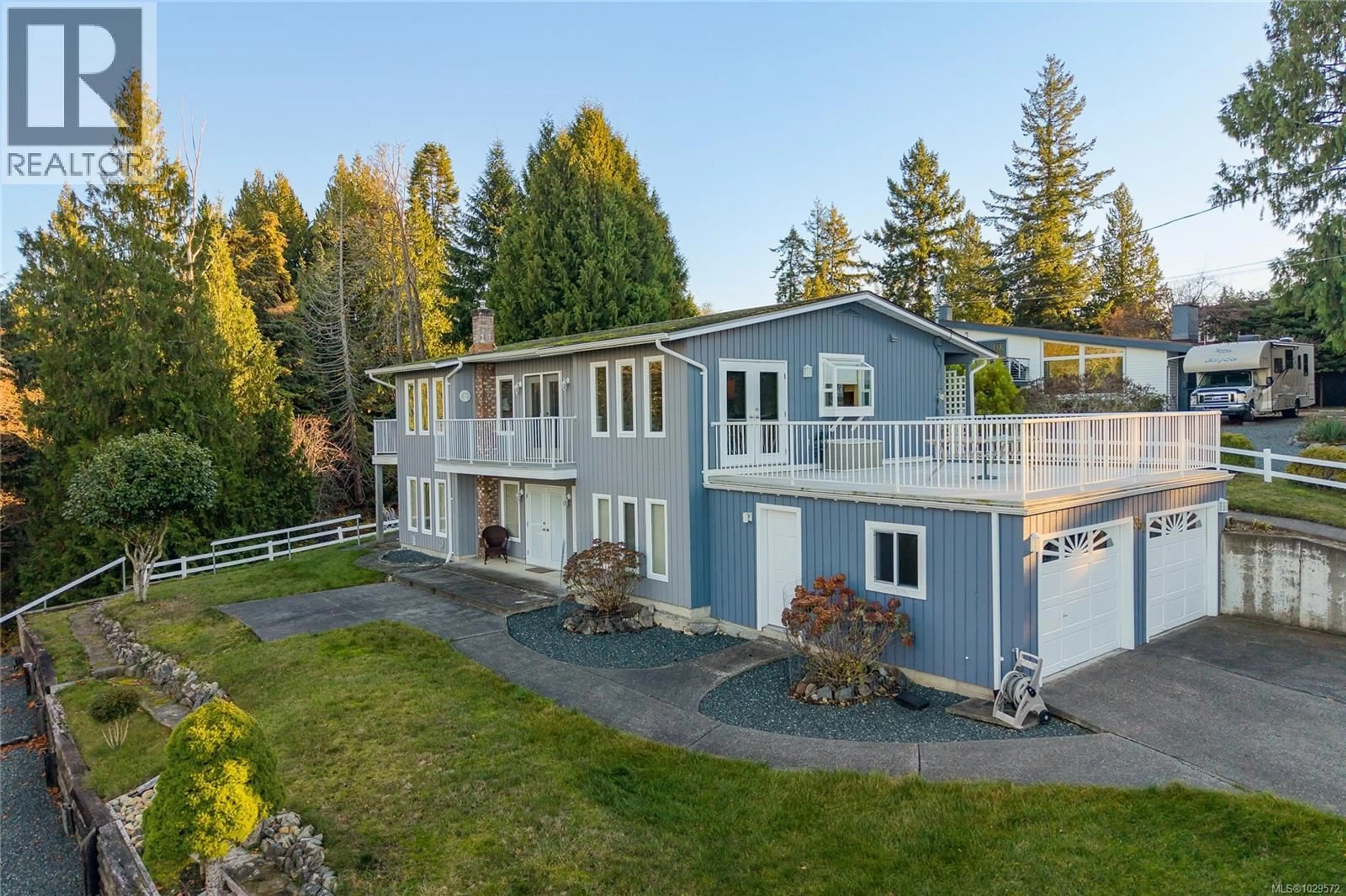 A pic from outside/outdoor area/front of a property/back of a property/a pic from drone, mountain view for 350 GARRETT ROAD, Qualicum Beach British Columbia V9K1H4