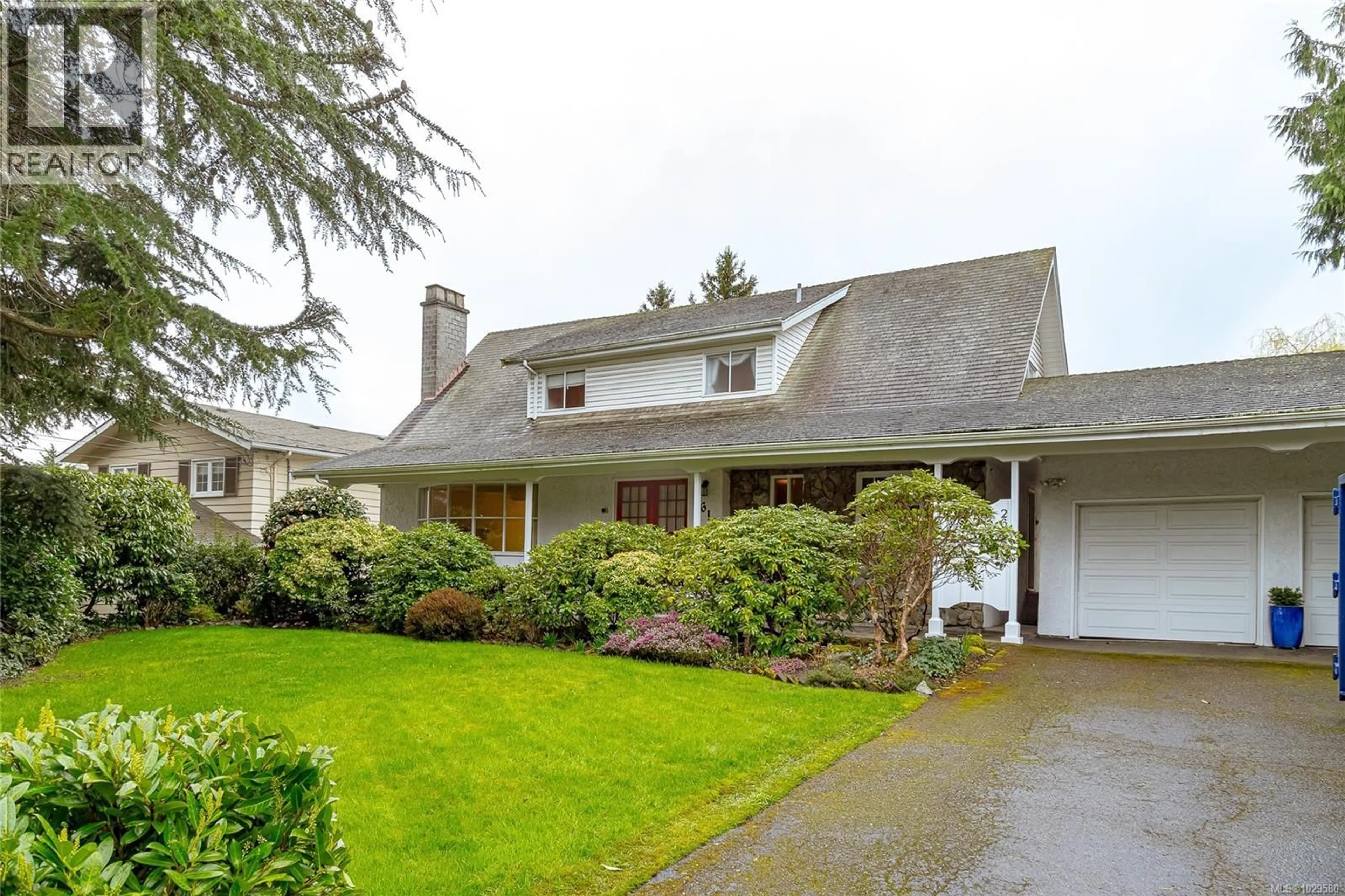 Home with vinyl exterior material, street for 2615 ARBUTUS ROAD, Saanich British Columbia V8N1W4