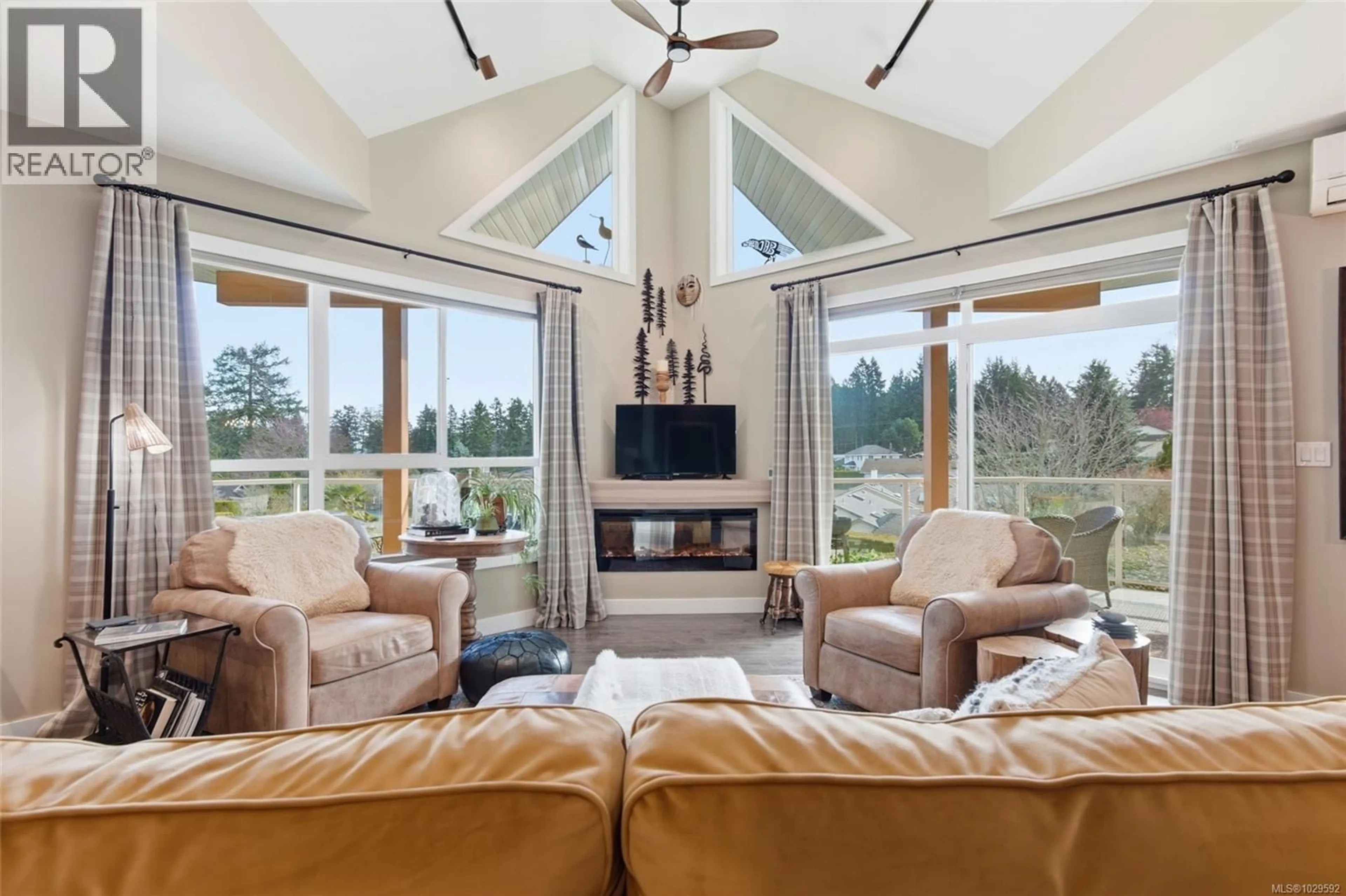 Living room with furniture, ceramic/tile floor for 303 - 439 COLLEGE ROAD, Qualicum Beach British Columbia V9K0B2