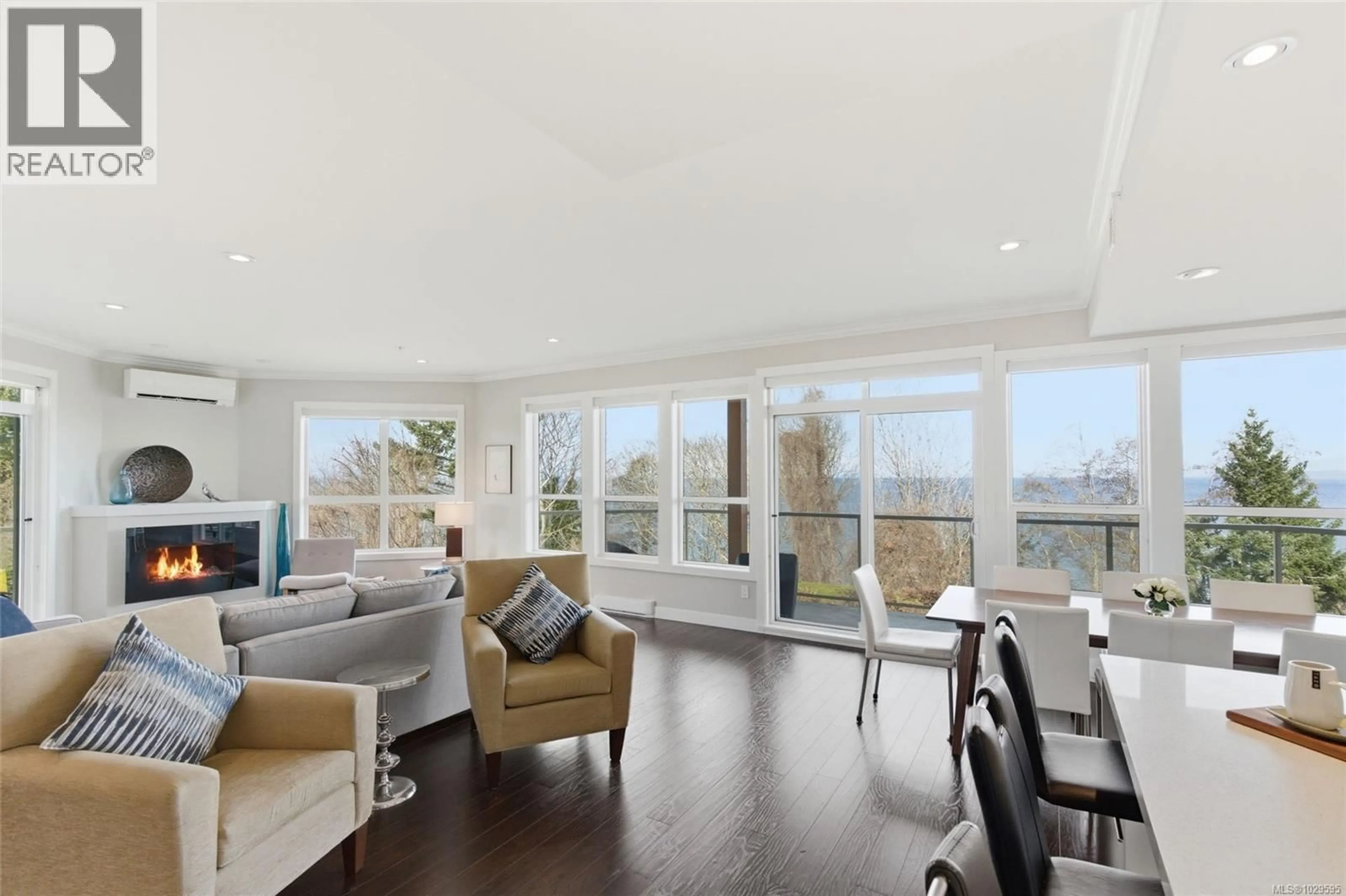 Living room with furniture, wood/laminate floor for 204 - 439 COLLEGE ROAD, Qualicum Beach British Columbia V9K0B2