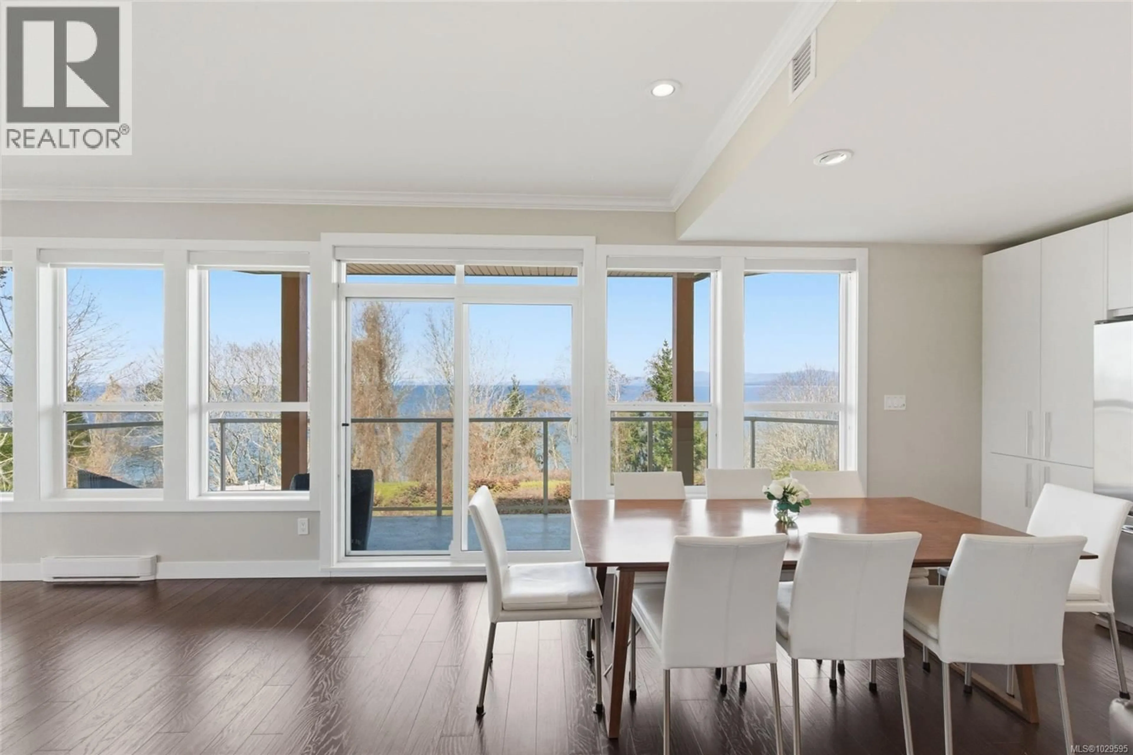 Dining room, wood/laminate floor for 204 - 439 COLLEGE ROAD, Qualicum Beach British Columbia V9K0B2