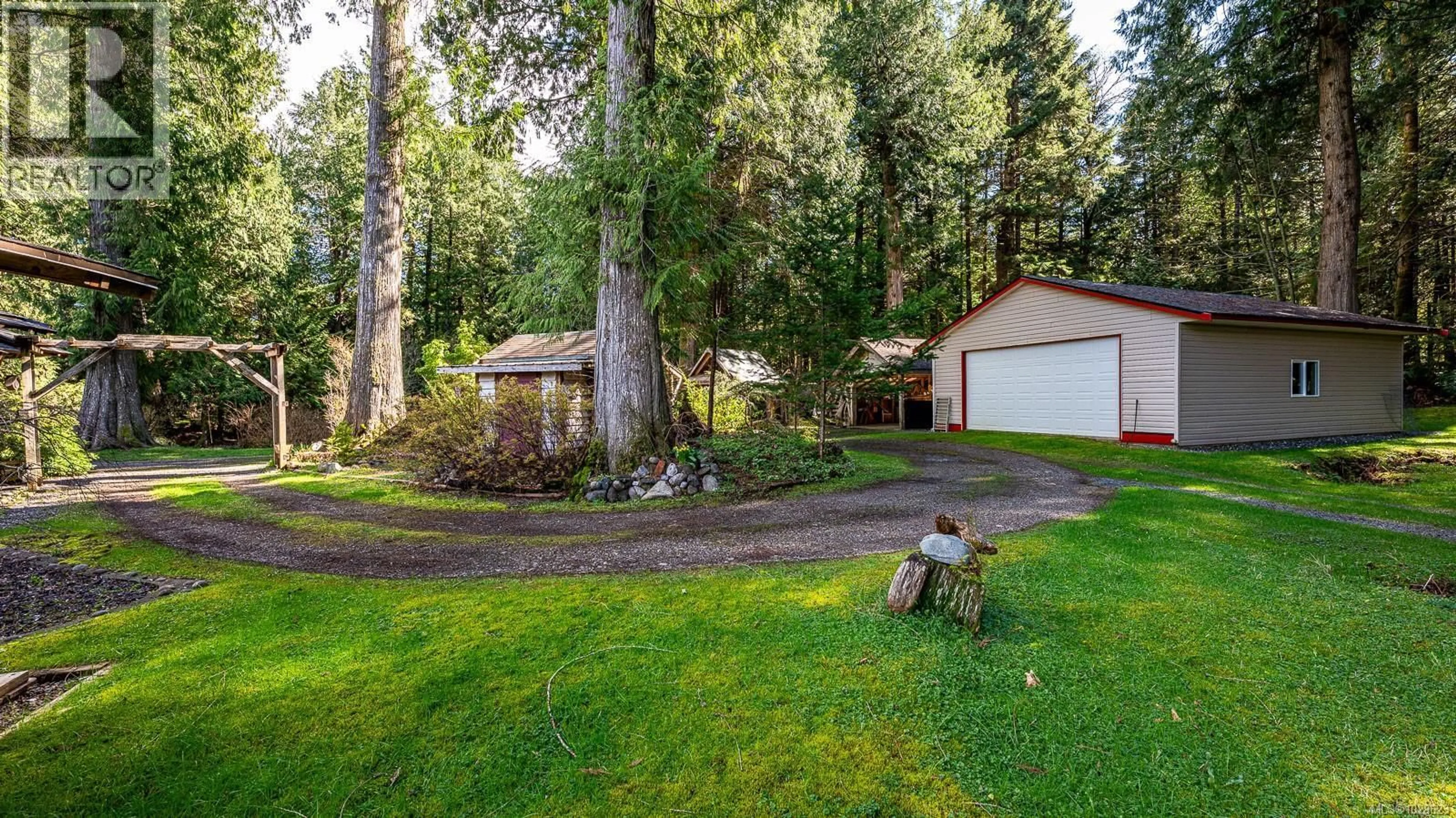 A pic from outside/outdoor area/front of a property/back of a property/a pic from drone, forest/trees view for 8131 MACARTNEY DRIVE, Fanny Bay British Columbia V0R1W0