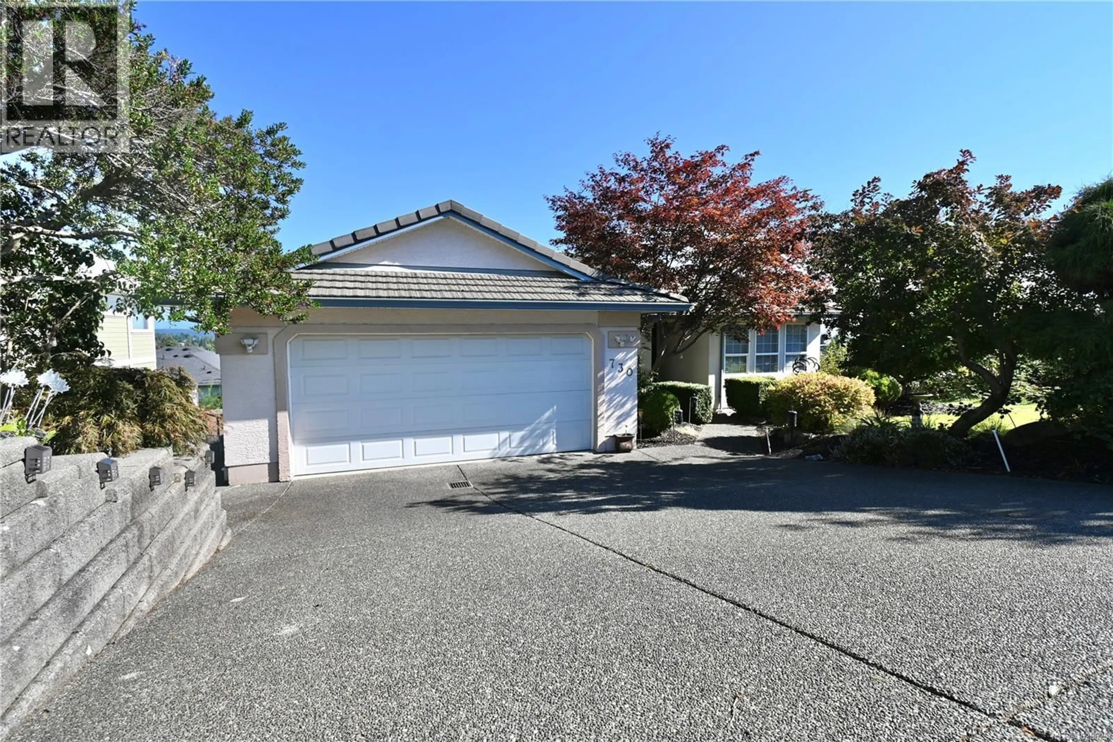 Home with vinyl exterior material, street for 730 NELSON ROAD, Campbell River British Columbia V9H1S1