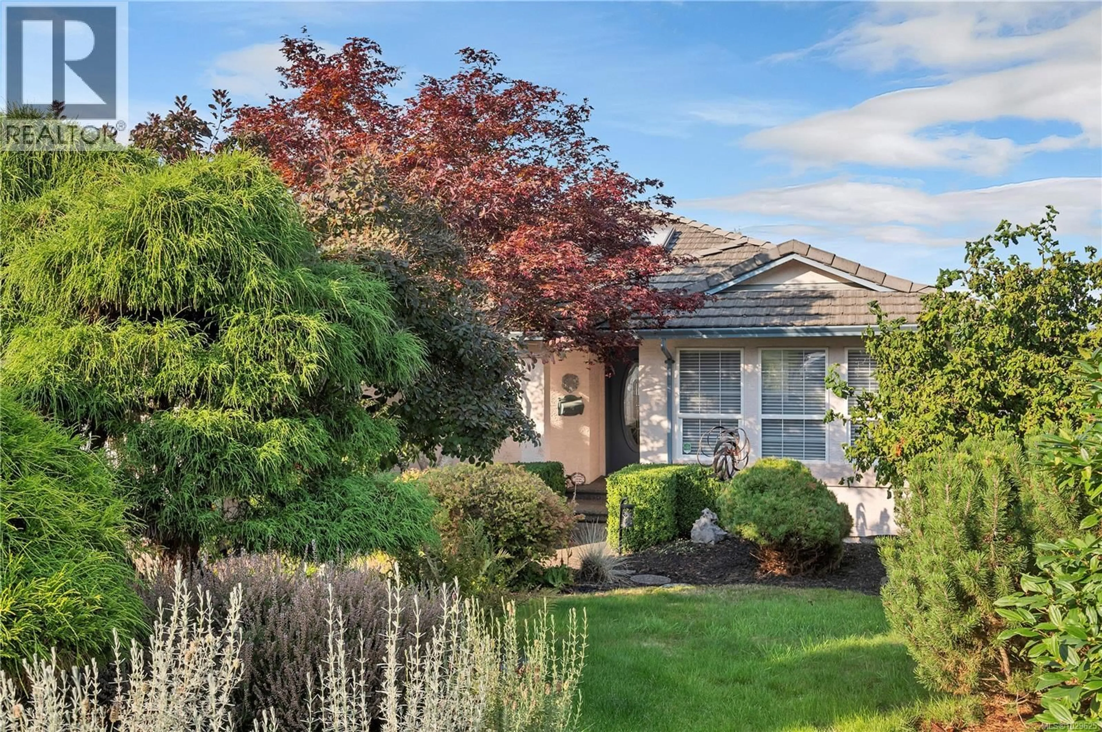 Home with vinyl exterior material, street for 730 NELSON ROAD, Campbell River British Columbia V9H1S1