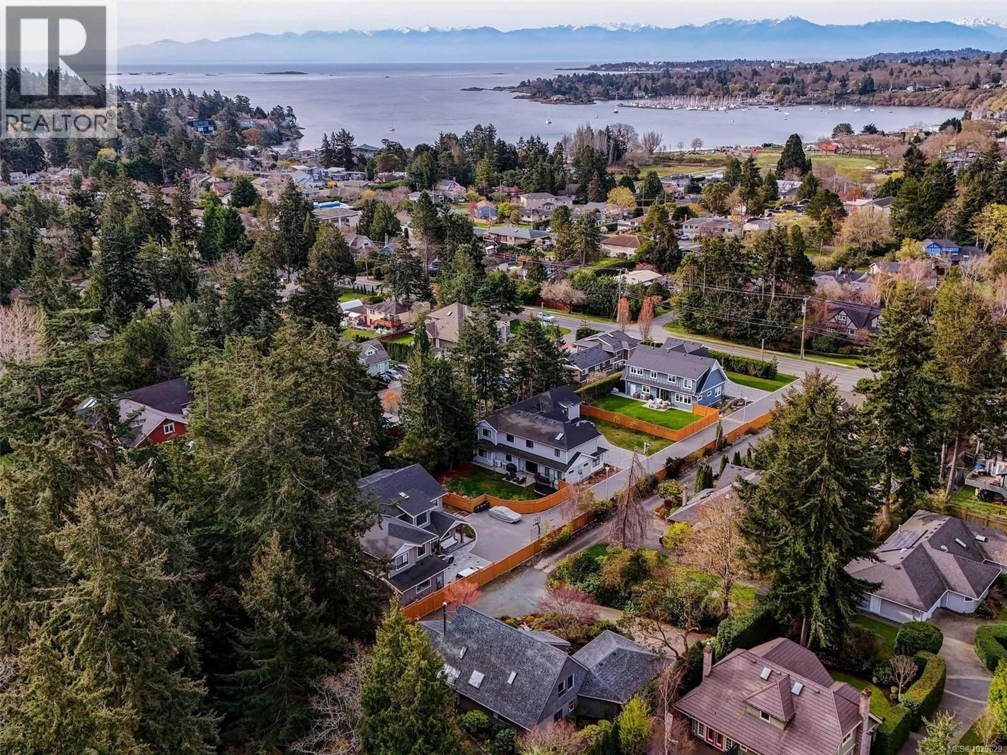 A pic from outside/outdoor area/front of a property/back of a property/a pic from drone, water/lake/river/ocean view for 2574 ARBUTUS ROAD, Saanich British Columbia V8N1W2