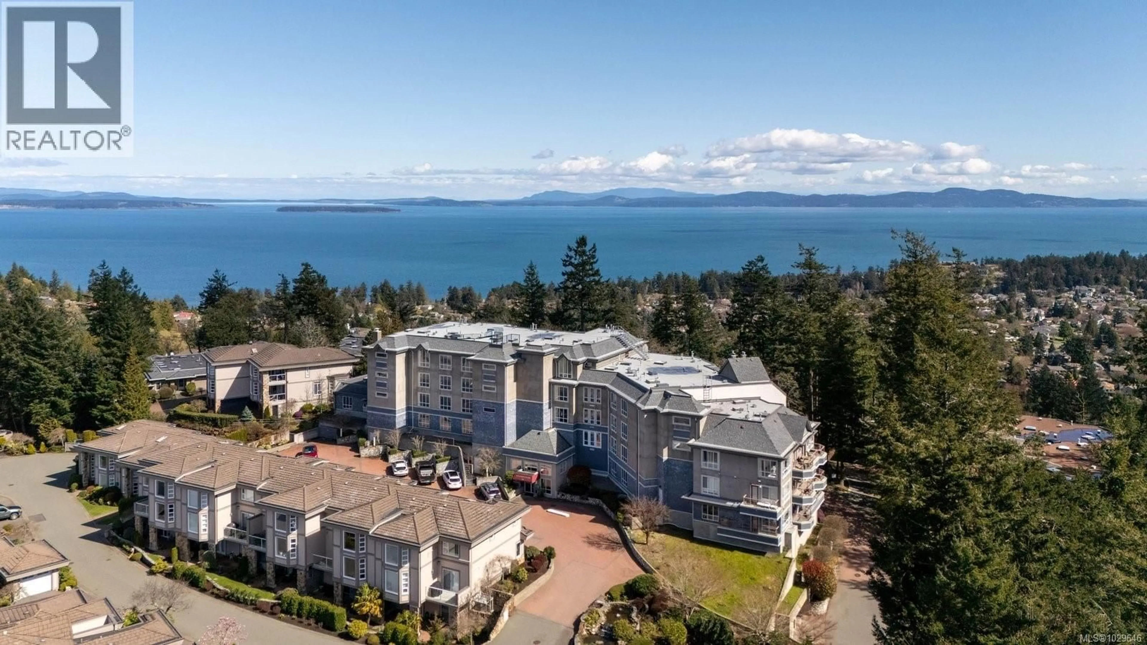 A pic from outside/outdoor area/front of a property/back of a property/a pic from drone, water/lake/river/ocean view for 406 - 940 BOULDERWOOD RISE, Saanich British Columbia V8Y3G5