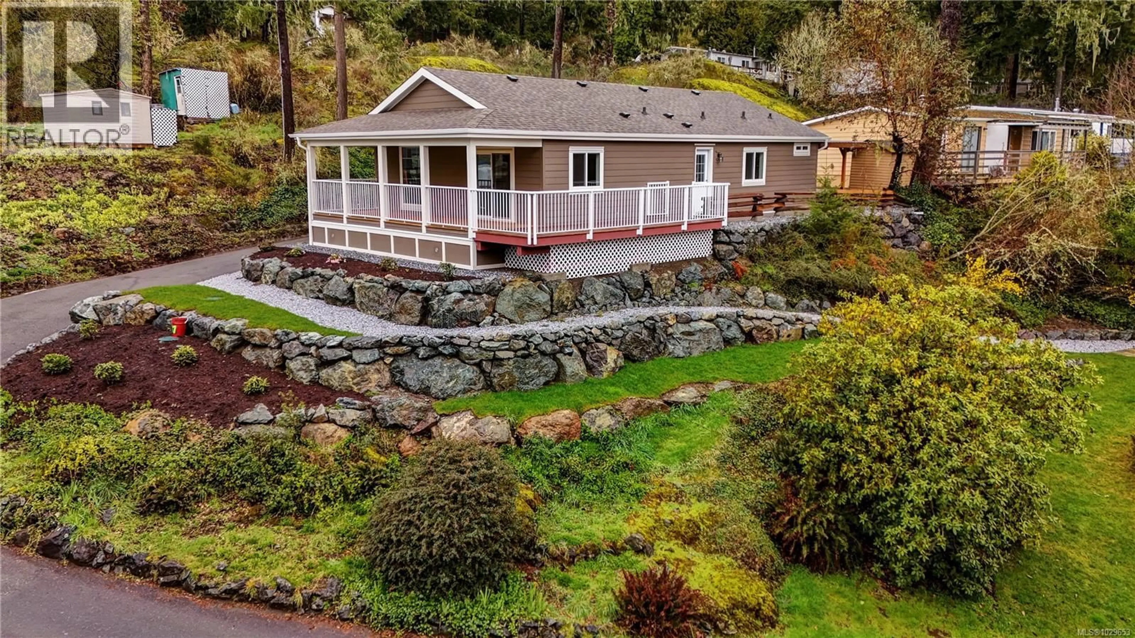 A pic from outside/outdoor area/front of a property/back of a property/a pic from drone, water/lake/river/ocean view for 37 - 5838 BLYTHWOOD ROAD, Sooke British Columbia V9Z0G3