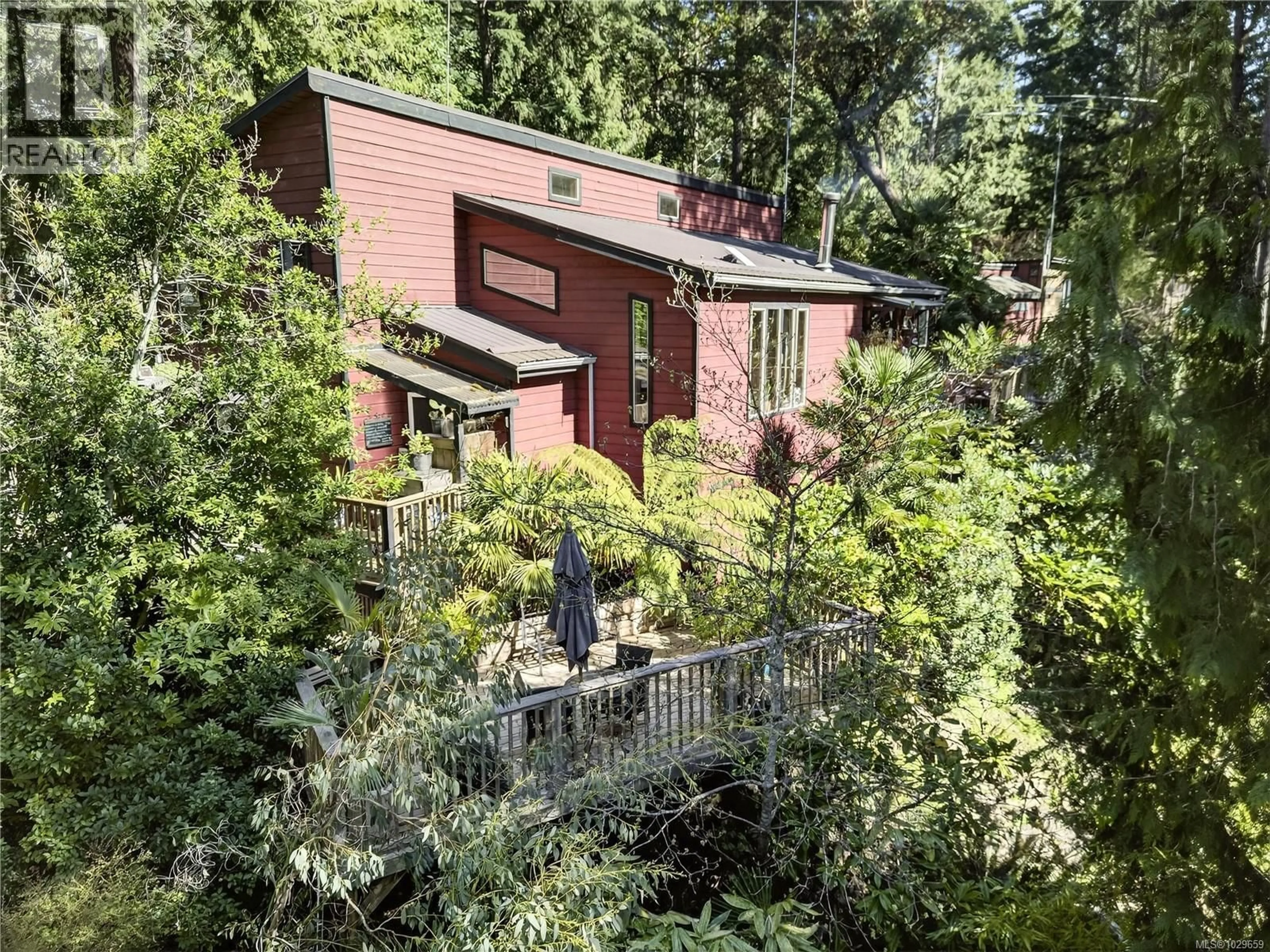 A pic from outside/outdoor area/front of a property/back of a property/a pic from drone, forest/trees view for 2470 NORTH END ROAD, Salt Spring British Columbia V8K1A9