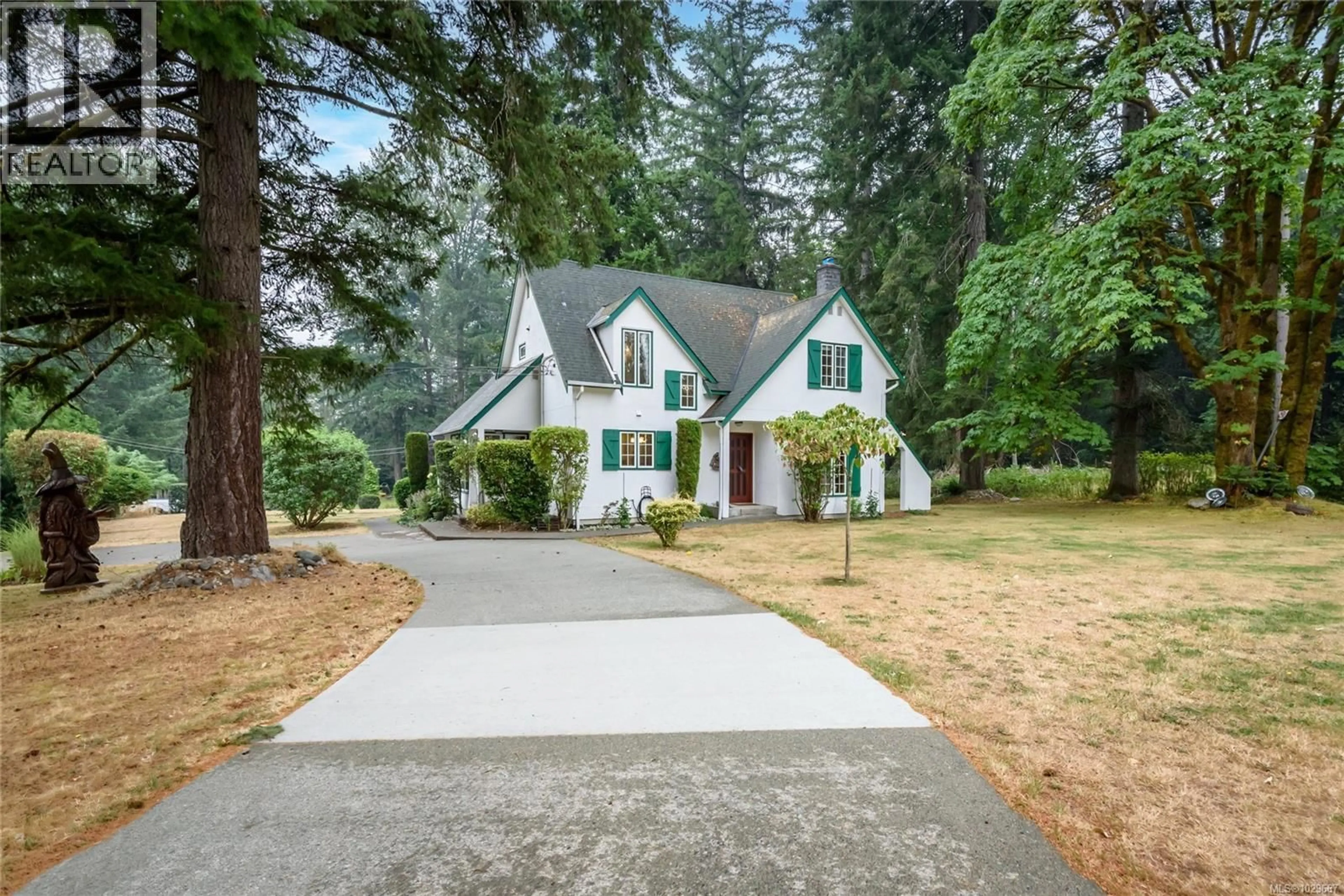 Home with vinyl exterior material, street for 2245 SCHULZ ROAD, Black Creek British Columbia V9J1K5