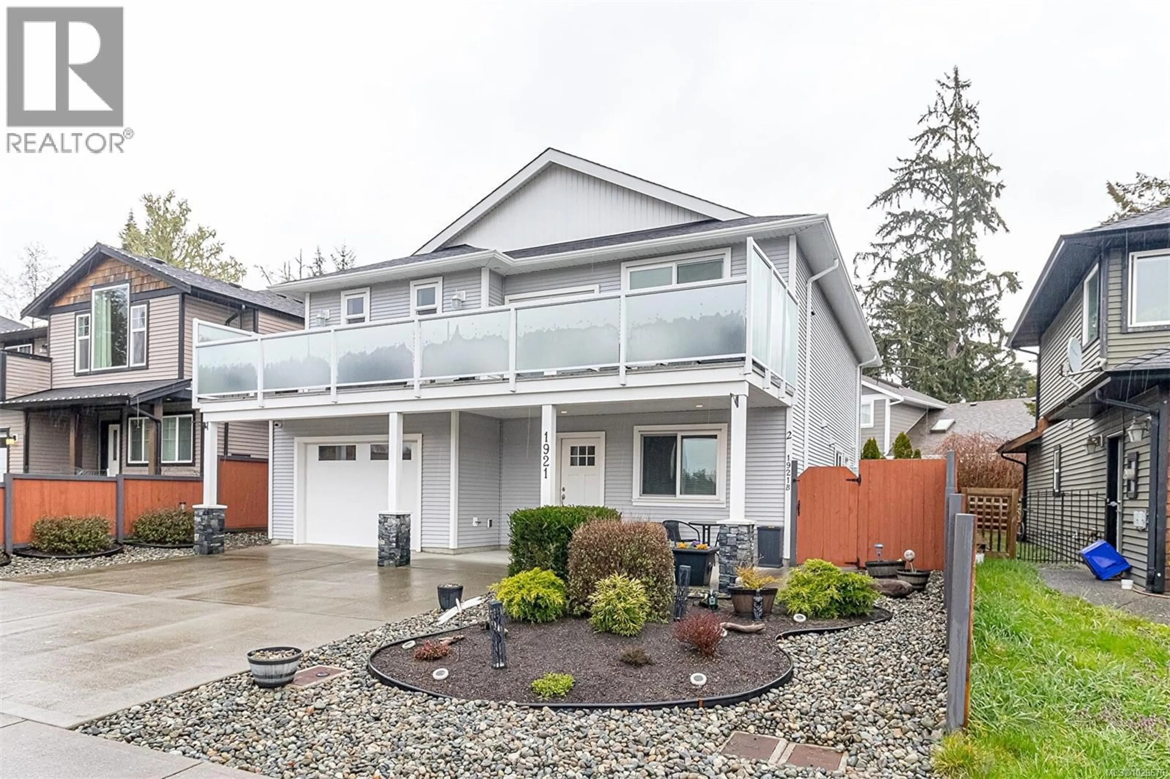 Home with vinyl exterior material, street for 1921 TOMINNY ROAD, Sooke British Columbia V9Z0P8