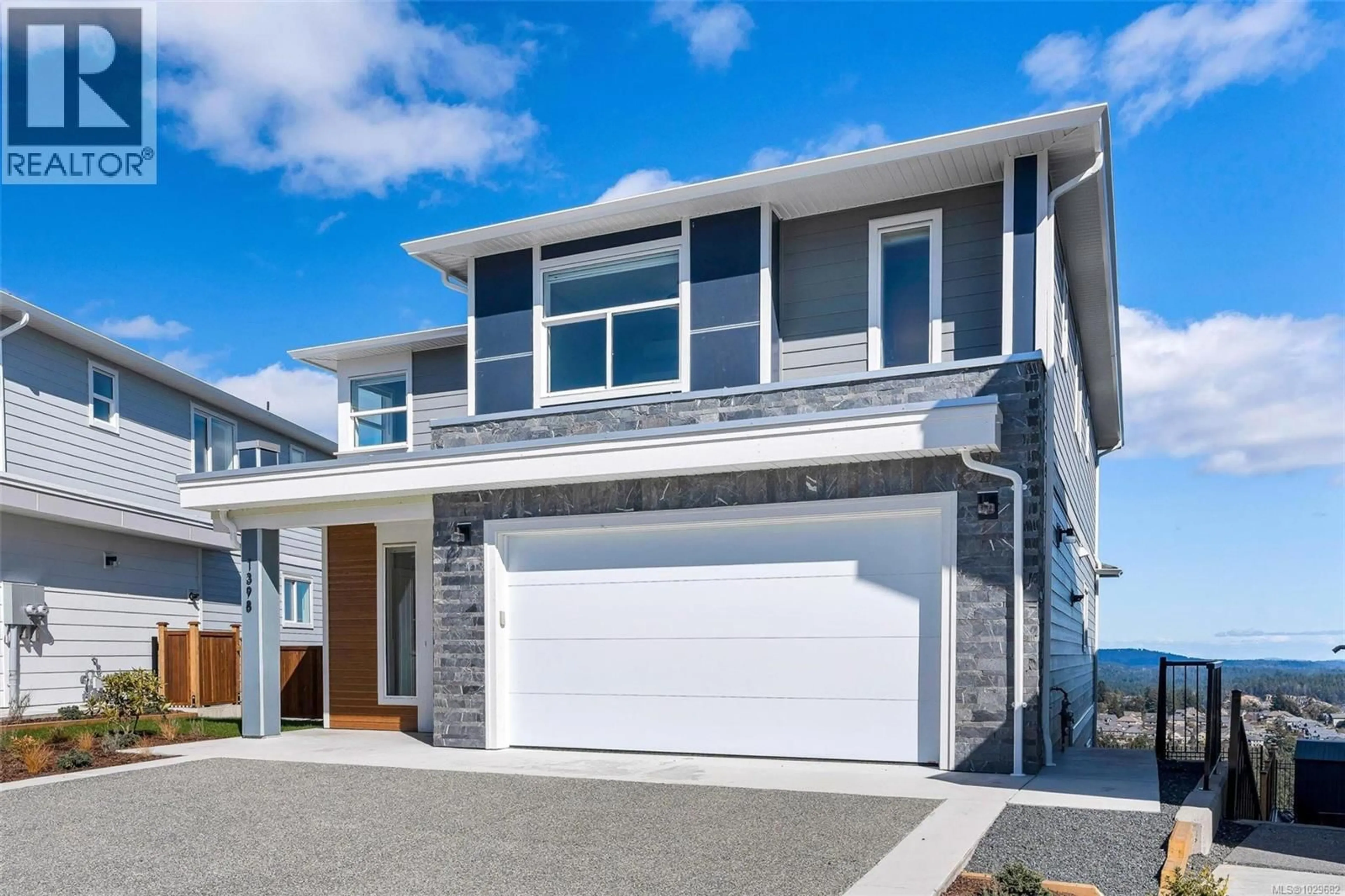 Home with vinyl exterior material, street for 1398 SANDSTONE LANE, Langford British Columbia V9B7A2