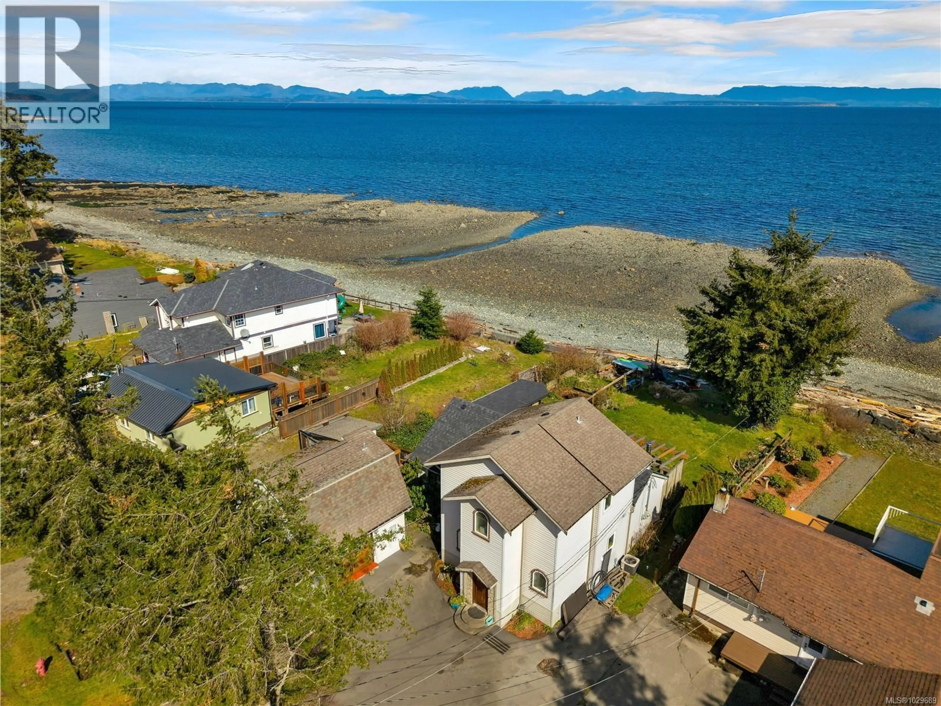 A pic from outside/outdoor area/front of a property/back of a property/a pic from drone, water/lake/river/ocean view for 4005 ISLAND HIGHWAY SOUTH, Campbell River British Columbia V9H1G4