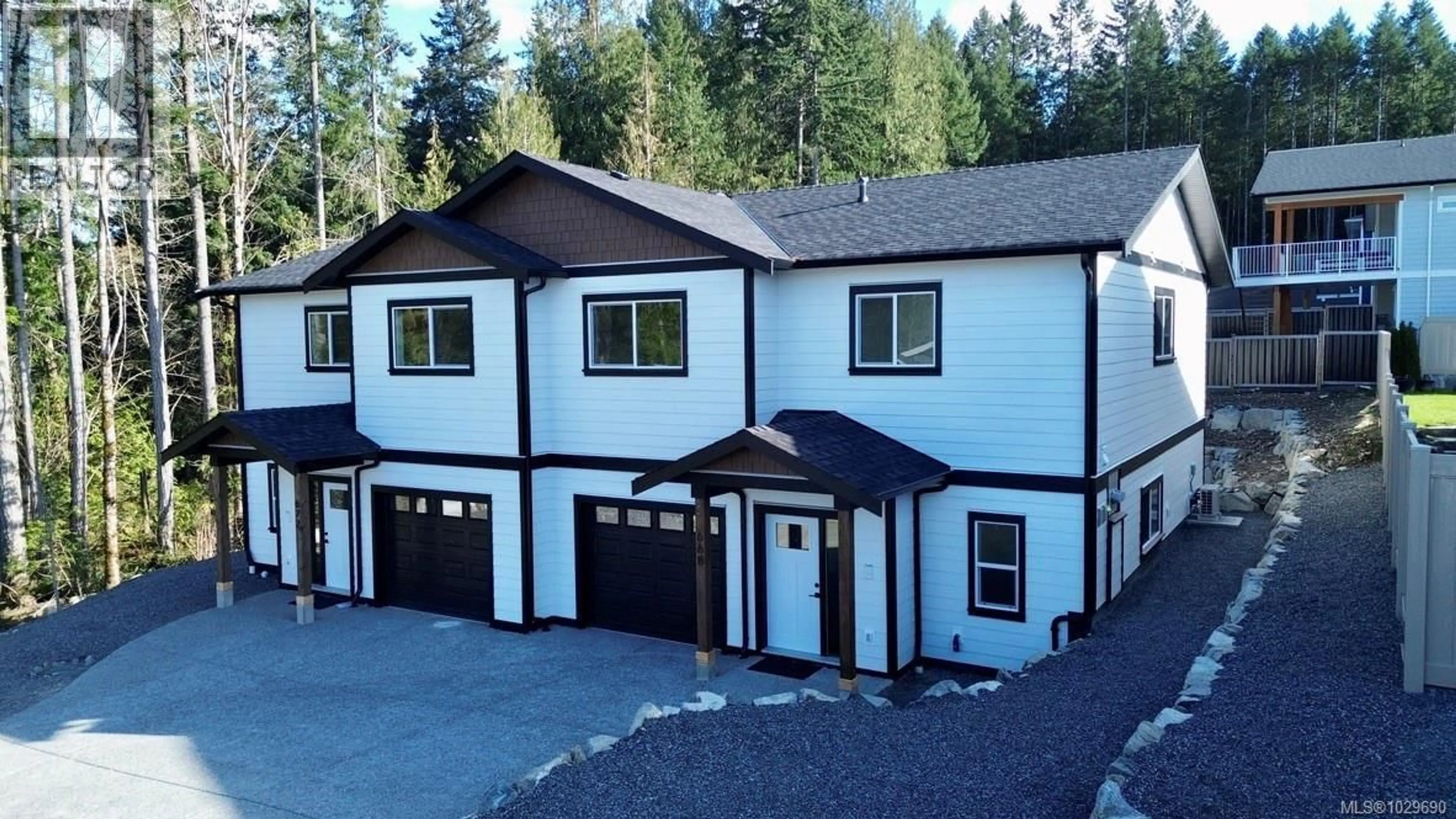 A pic from outside/outdoor area/front of a property/back of a property/a pic from drone, street for 668 SANDERSON ROAD, Ladysmith British Columbia V9G0A7
