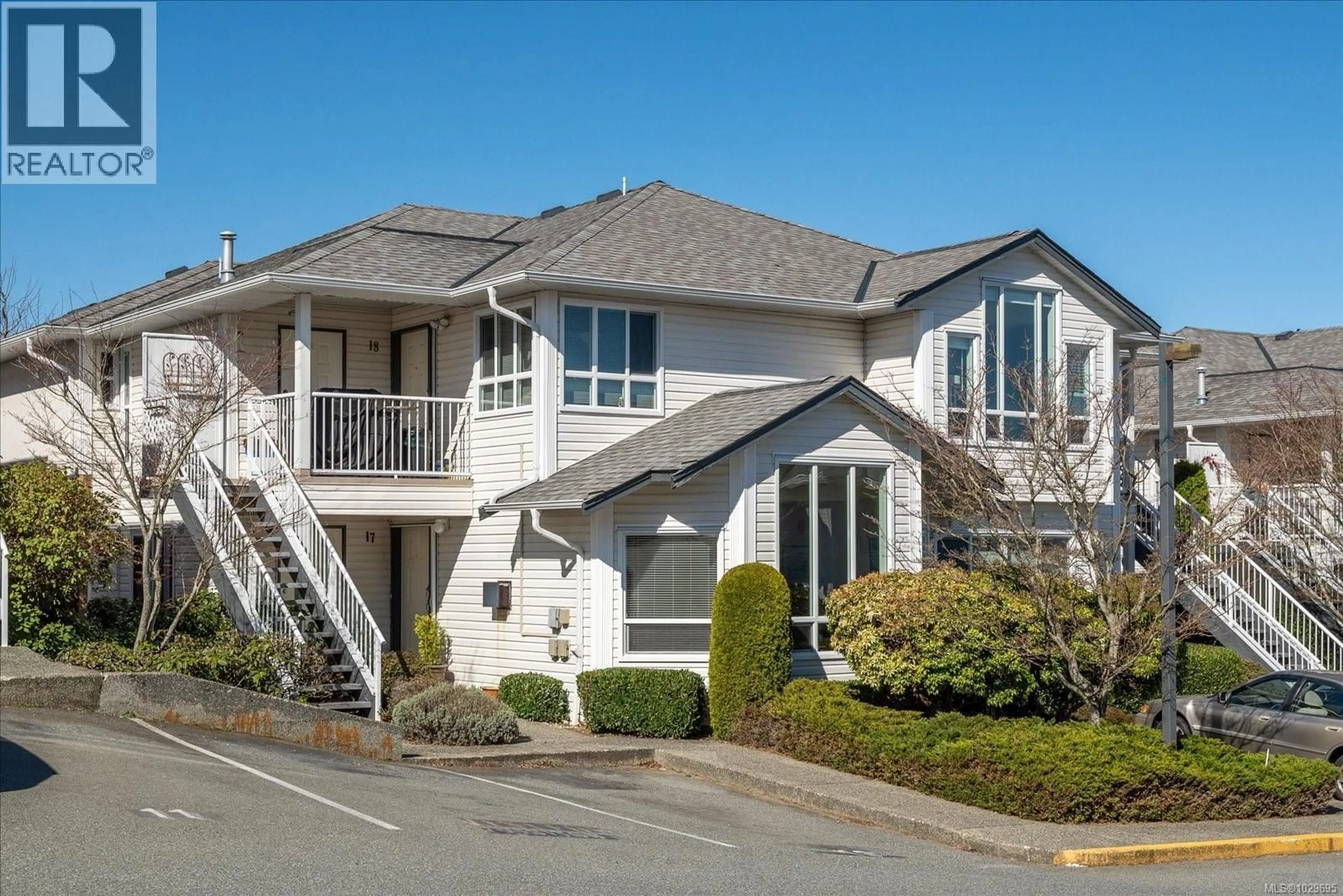 Home with vinyl exterior material, street for 17 - 6245 BLUEBACK ROAD, Nanaimo British Columbia V9V1N7