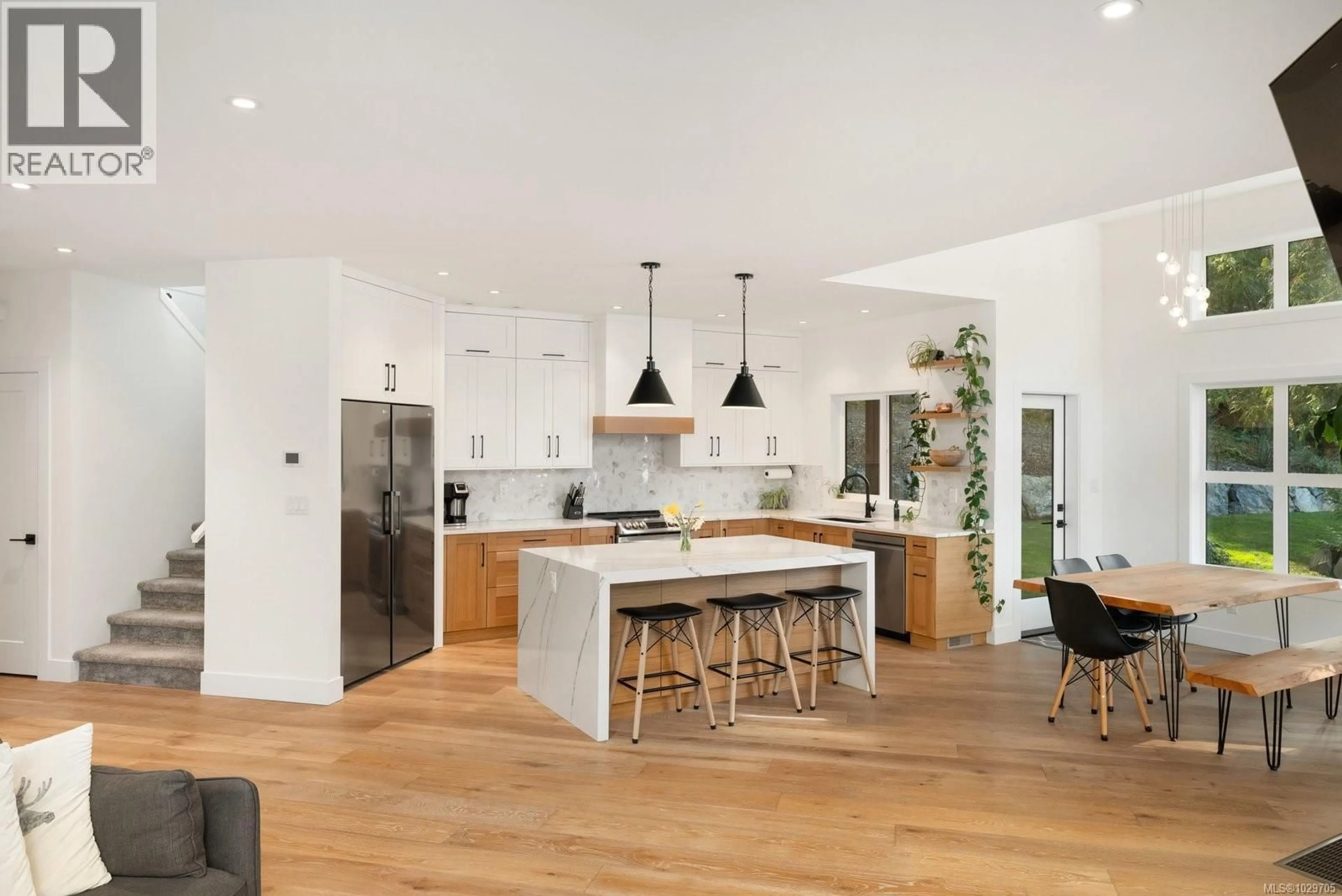 Open concept kitchen, wood/laminate floor for 1535 EAGLE WAY, North Saanich British Columbia V8L5S3