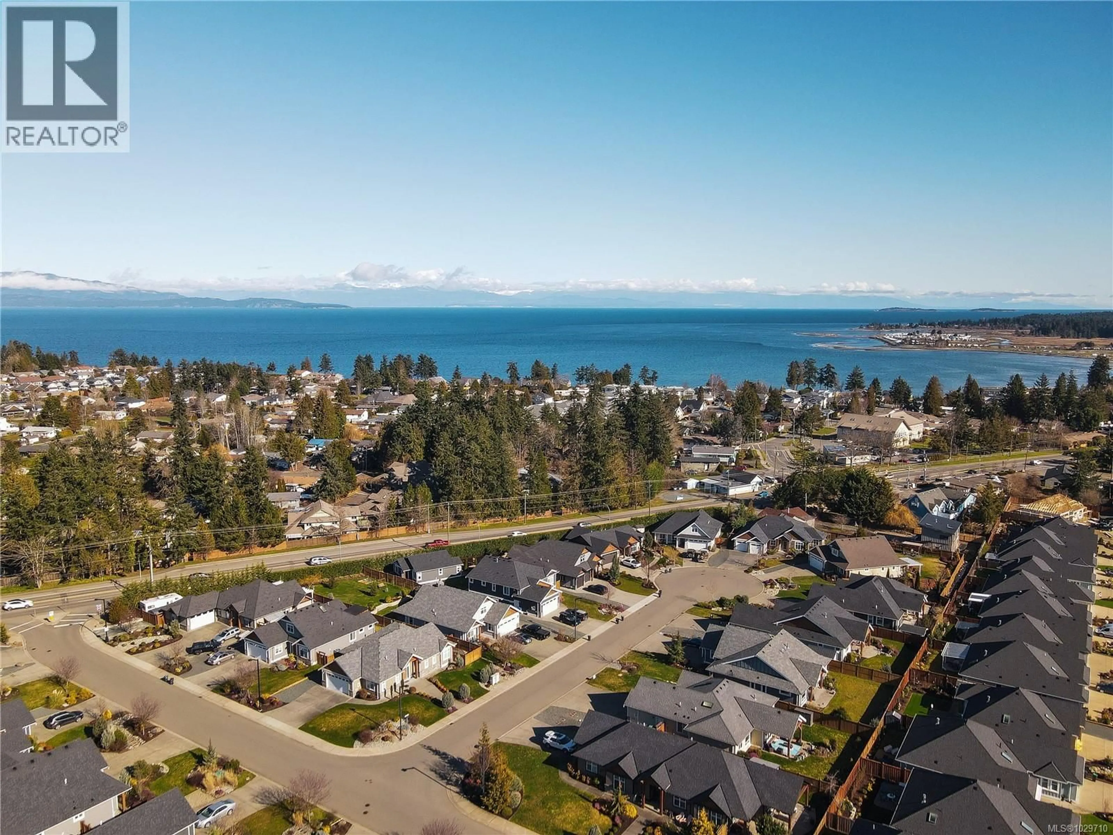 A pic from outside/outdoor area/front of a property/back of a property/a pic from drone, water/lake/river/ocean view for 214 CAMERON STREET, Parksville British Columbia V9P1G7
