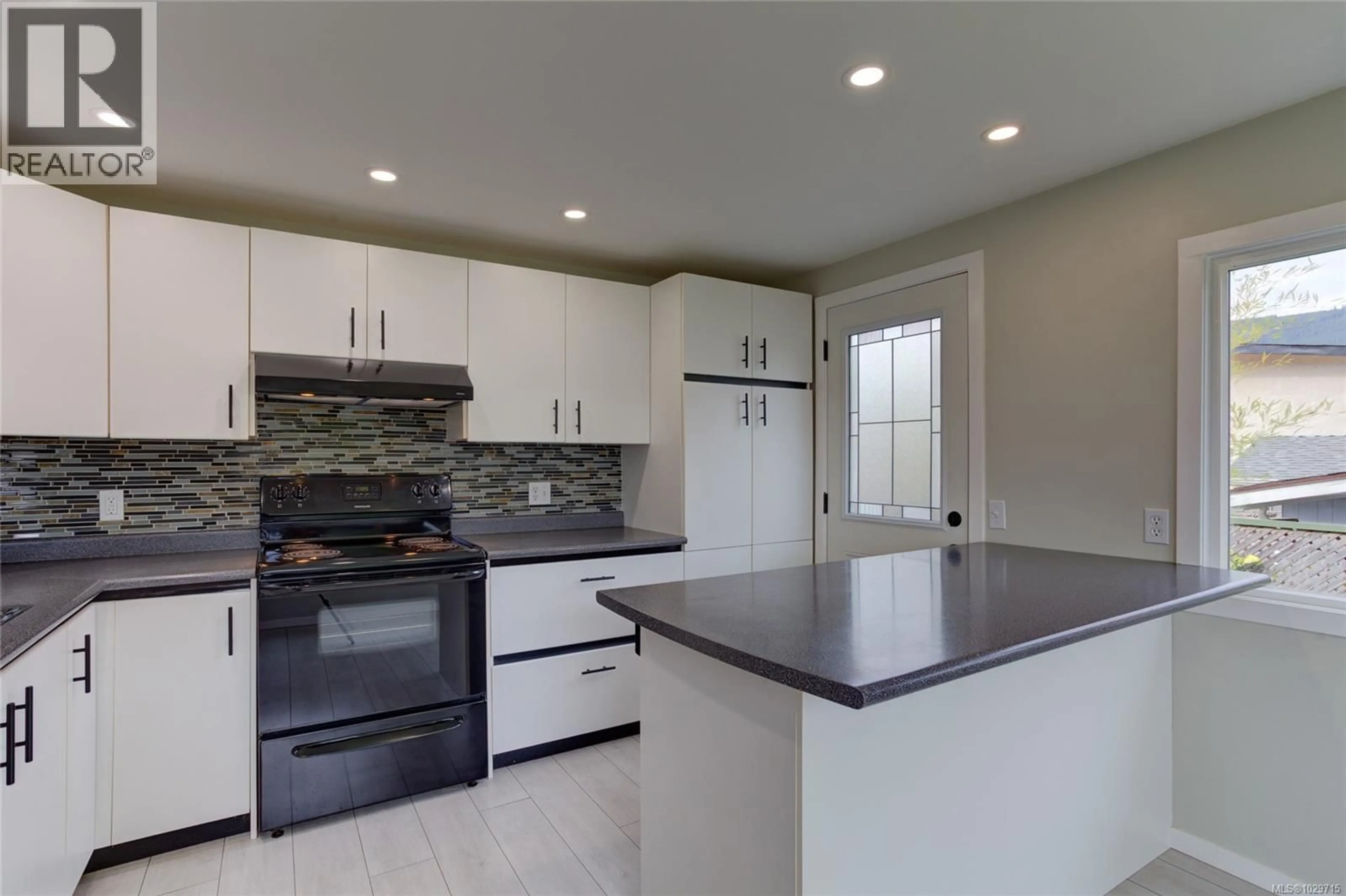 Open concept kitchen, ceramic/tile floor for 129 JOHEL ROAD, Lake Cowichan British Columbia V0R2G0