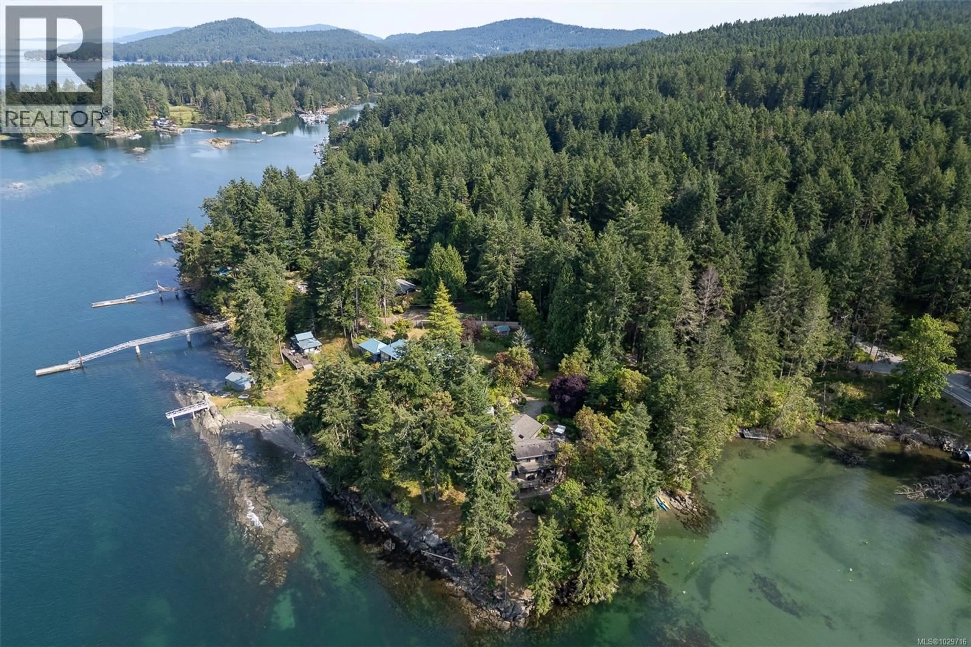 A pic from outside/outdoor area/front of a property/back of a property/a pic from drone, water/lake/river/ocean view for 1 - 835 STURDIES BAY ROAD, Galiano Island British Columbia V0N0E9