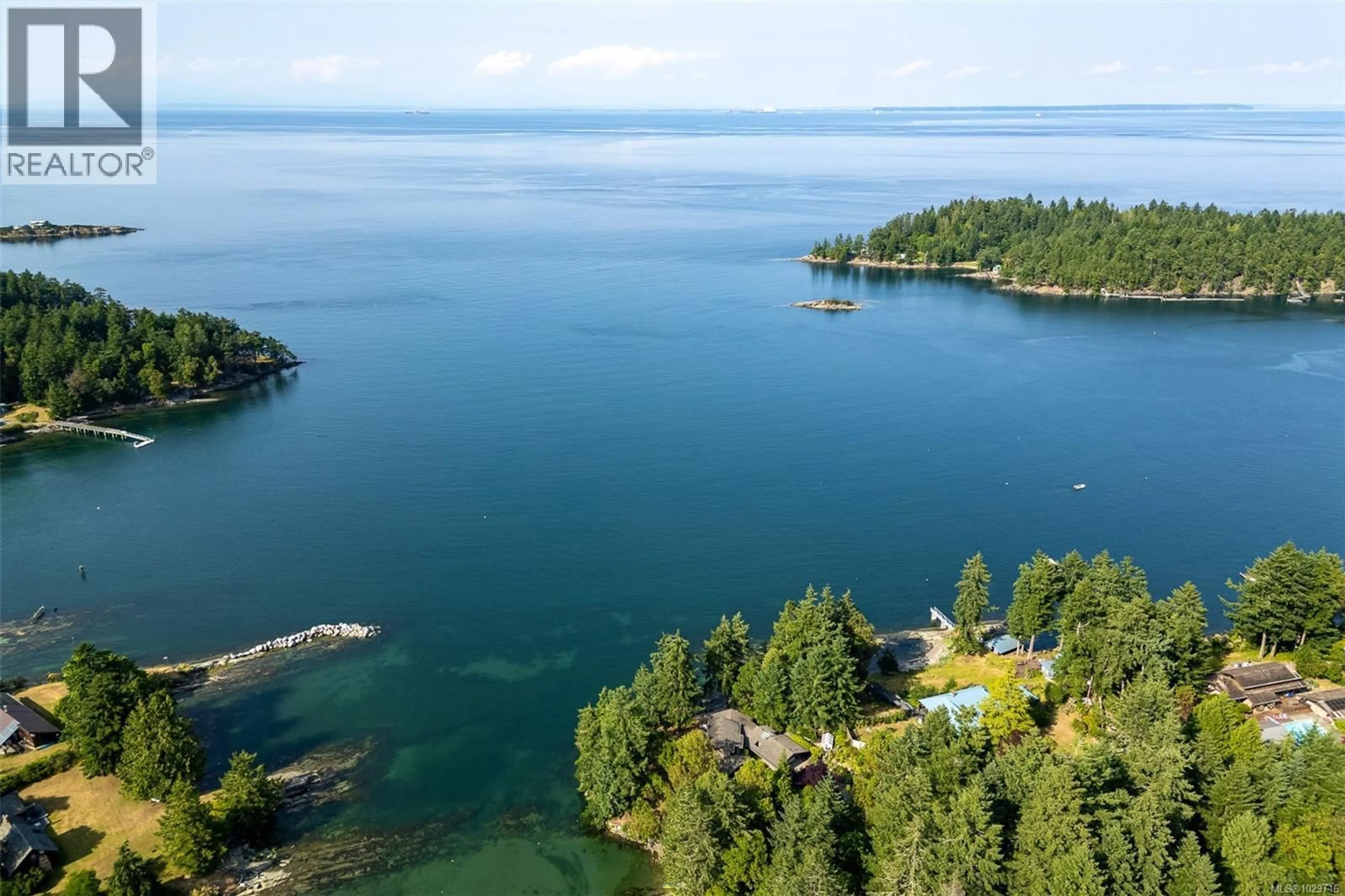 A pic from outside/outdoor area/front of a property/back of a property/a pic from drone, water/lake/river/ocean view for 1 - 835 STURDIES BAY ROAD, Galiano Island British Columbia V0N0E9