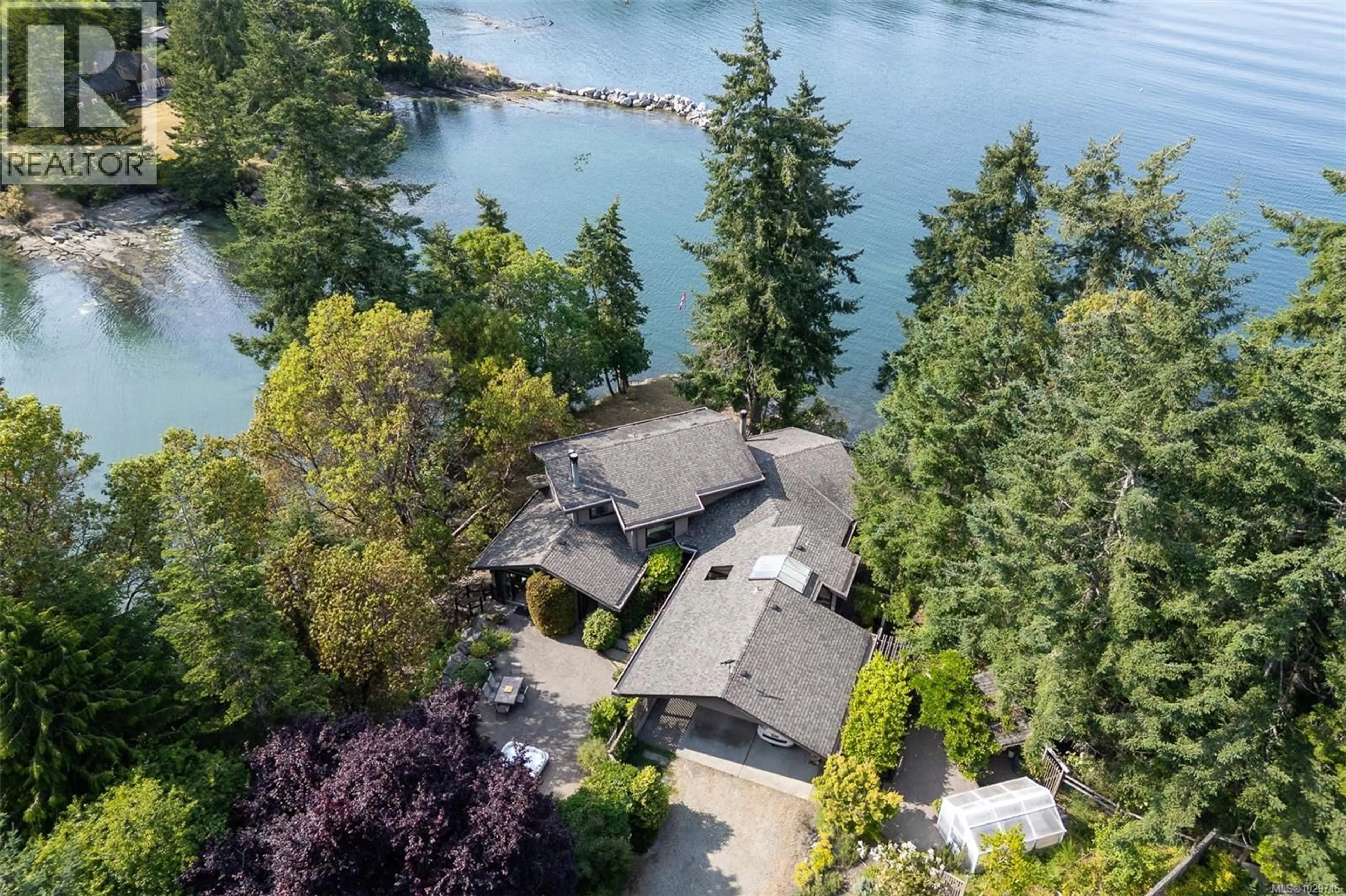 A pic from outside/outdoor area/front of a property/back of a property/a pic from drone, water/lake/river/ocean view for 1 - 835 STURDIES BAY ROAD, Galiano Island British Columbia V0N0E9