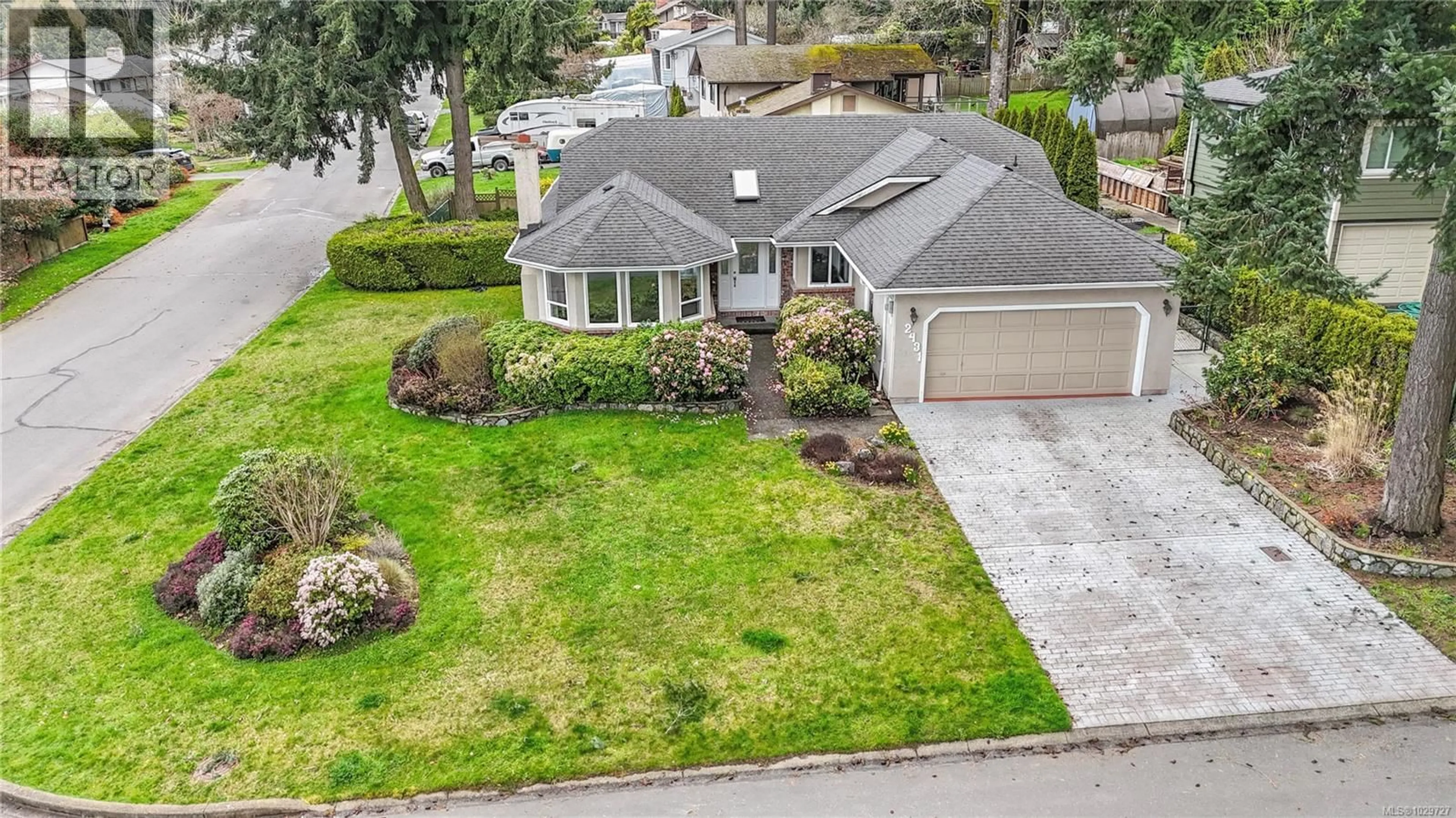 A pic from outside/outdoor area/front of a property/back of a property/a pic from drone, street for 2431 WILCOX TERRACE, Central Saanich British Columbia V8Z5R7