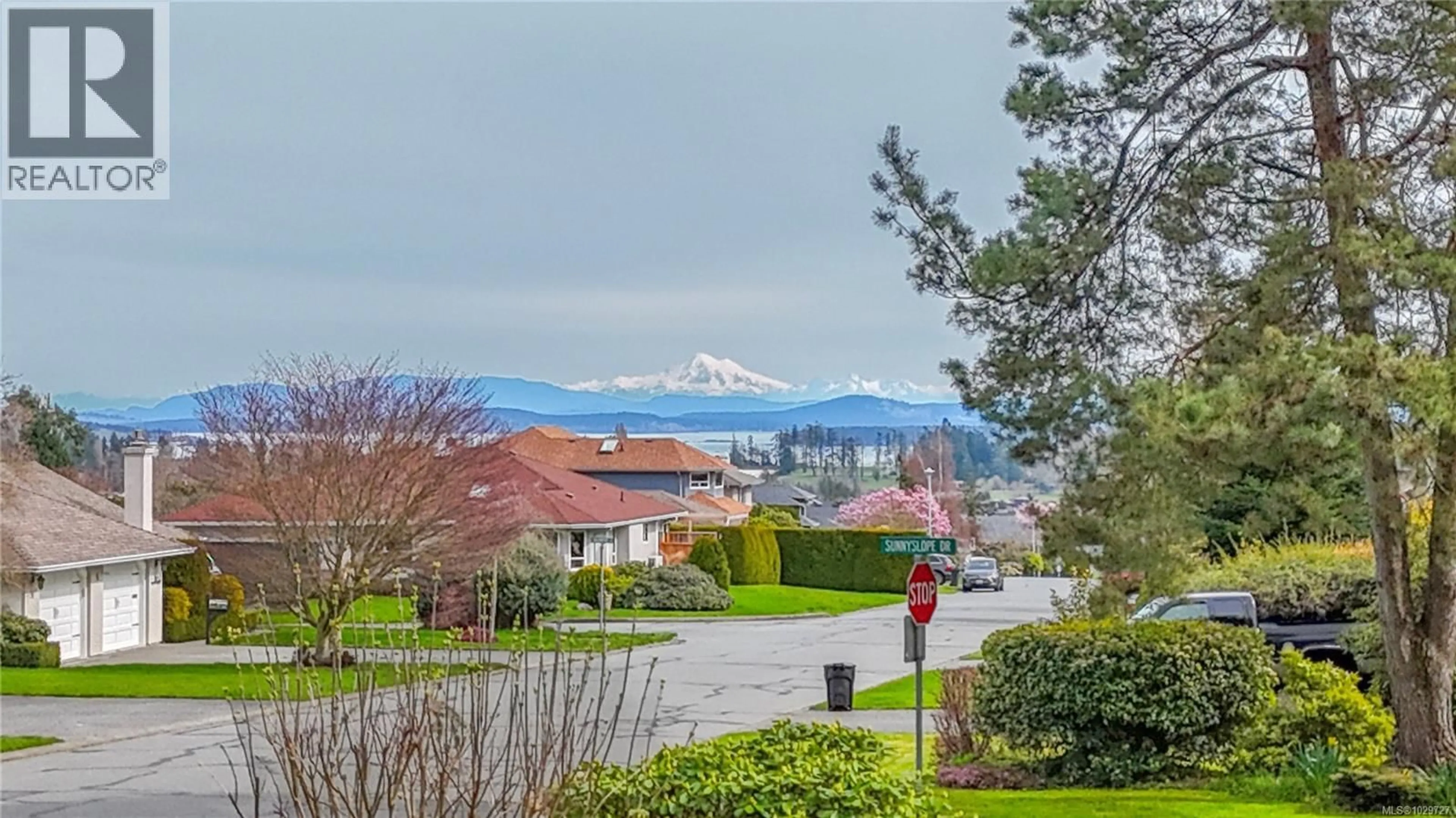 A pic from outside/outdoor area/front of a property/back of a property/a pic from drone, mountain view for 2431 WILCOX TERRACE, Central Saanich British Columbia V8Z5R7