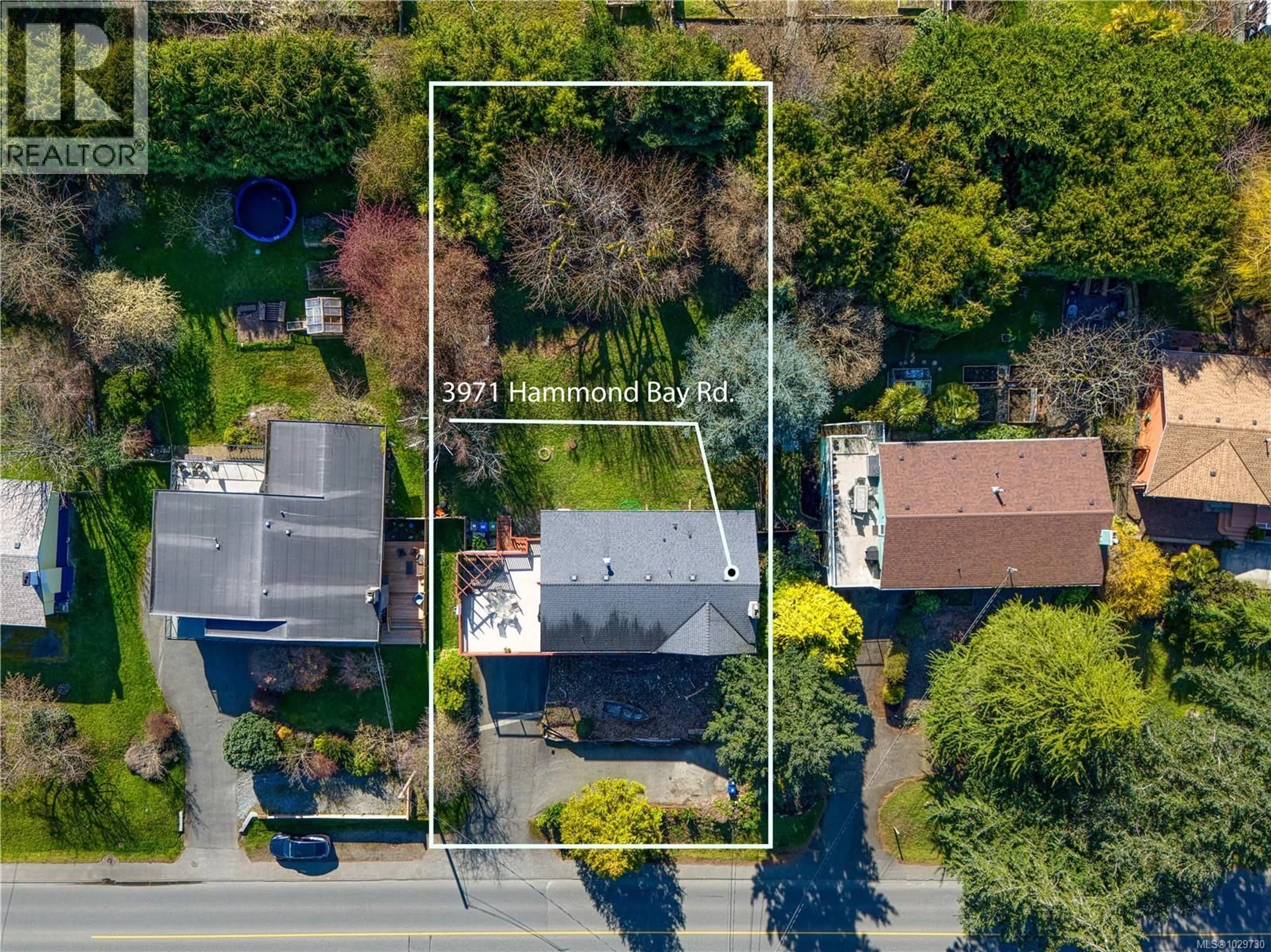 A pic from outside/outdoor area/front of a property/back of a property/a pic from drone, street for 3971 HAMMOND BAY ROAD, Nanaimo British Columbia V9T1G4